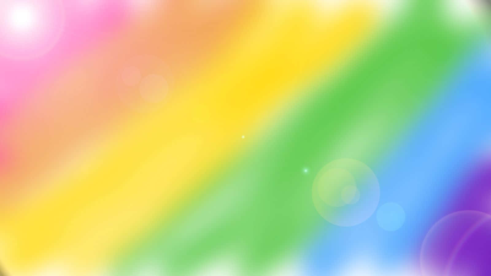 Rainbow Colours 桌布 壁紙 — 充滿活力的對角彩虹漸變，帶有柔和散景燈光和發光高光。