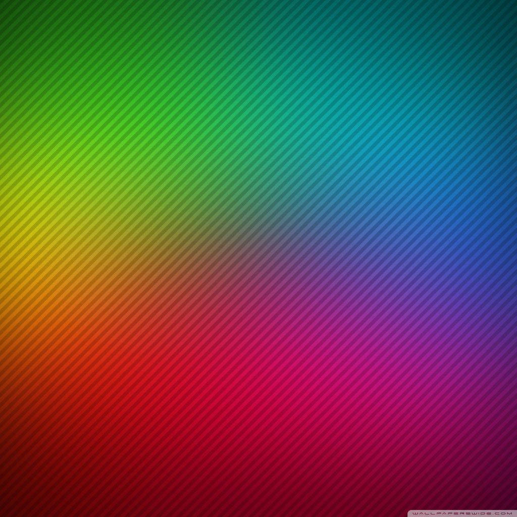 RGB 桌布 壁紙 — 充滿活力的對角彩虹漸變，帶有精細的平行線，營造出動感多彩的圖案。