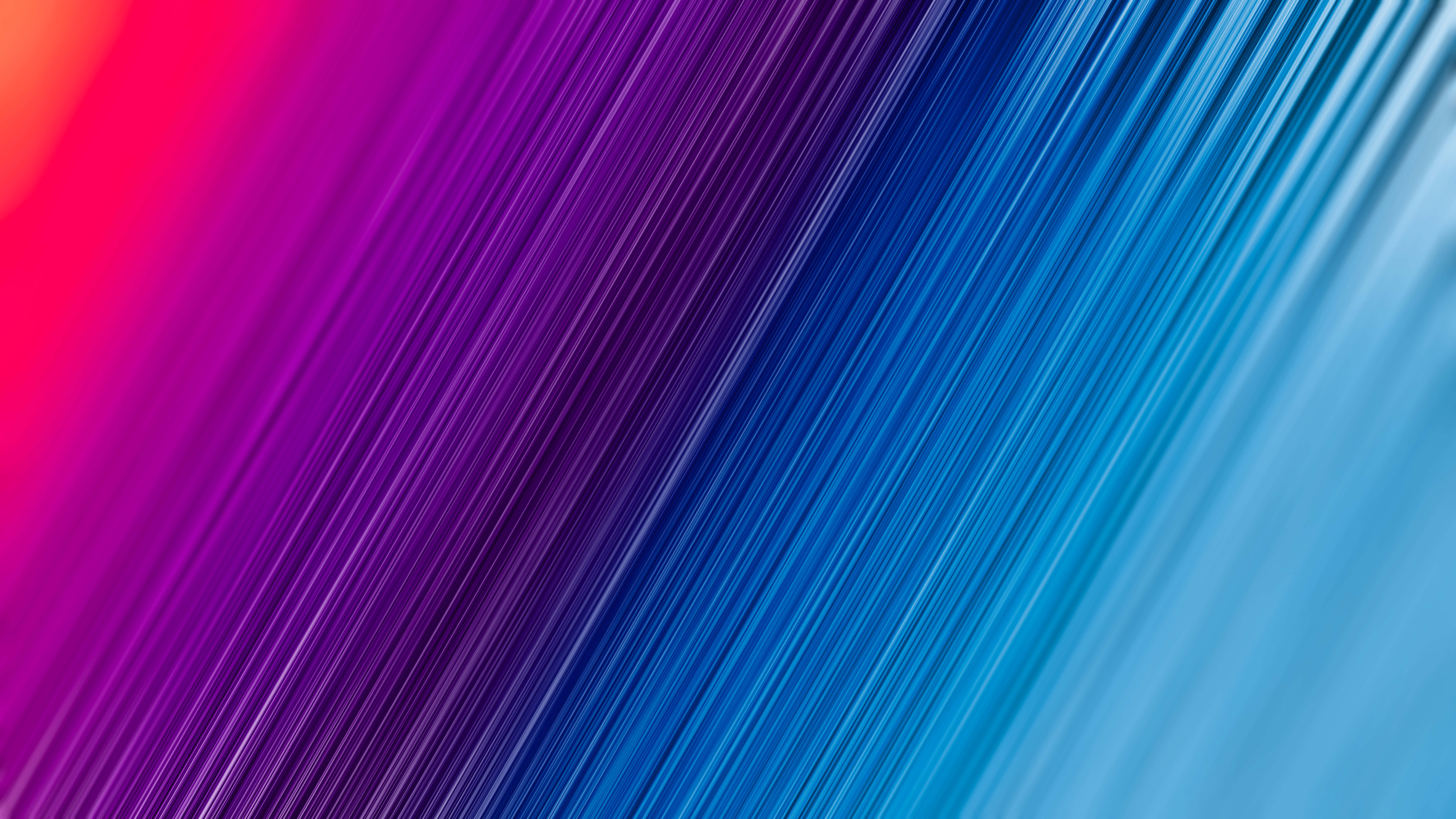 Colorful Abstract Art 桌布 壁紙 — 充滿活力的對角線色彩條紋，從火紅過渡到冷藍，形成動態的抽象漸變。