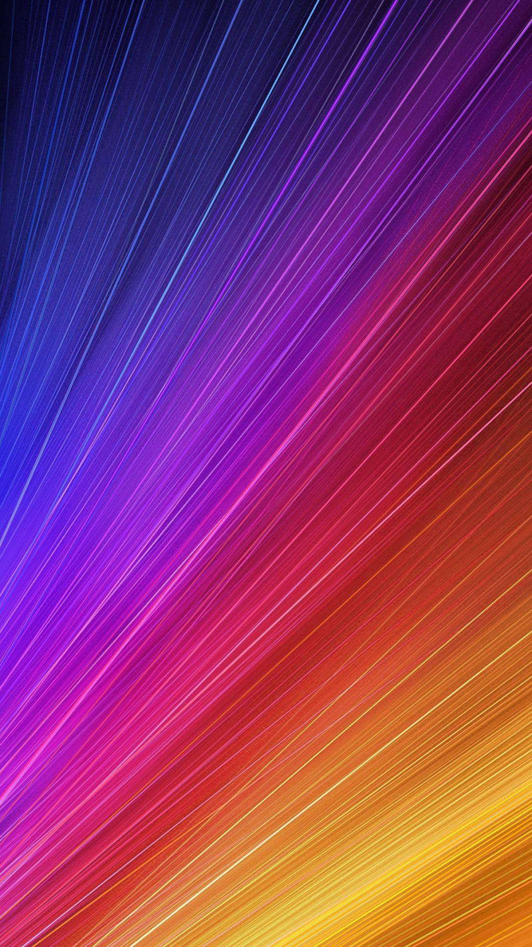 Xiaomi 桌布 壁紙 — 充滿活力的對角線色彩條紋從深藍色流向火黃色，形成動態的抽象漸變。