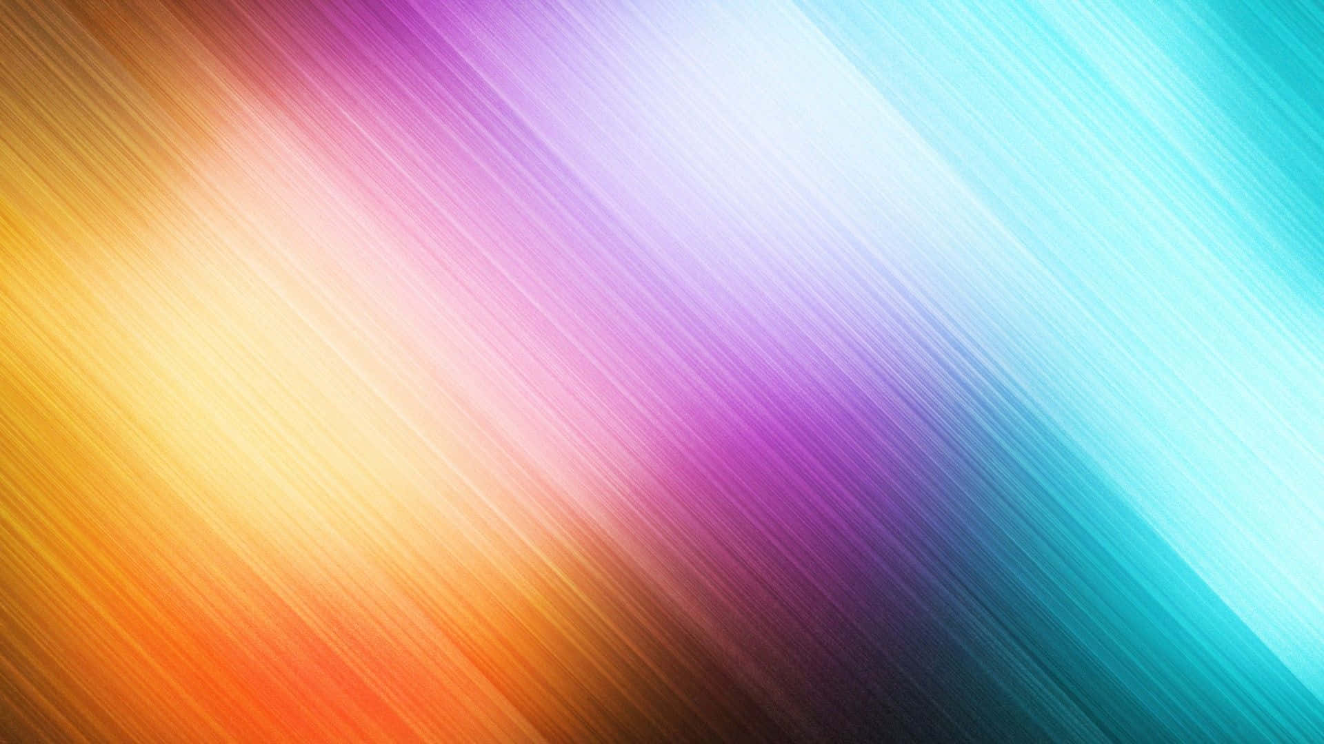 Rainbow Colours 桌布 壁紙 — 充滿活力的對角線色彩條紋從溫暖的橙色平滑過渡到冷色調的青色，形成動態的抽象漸變。