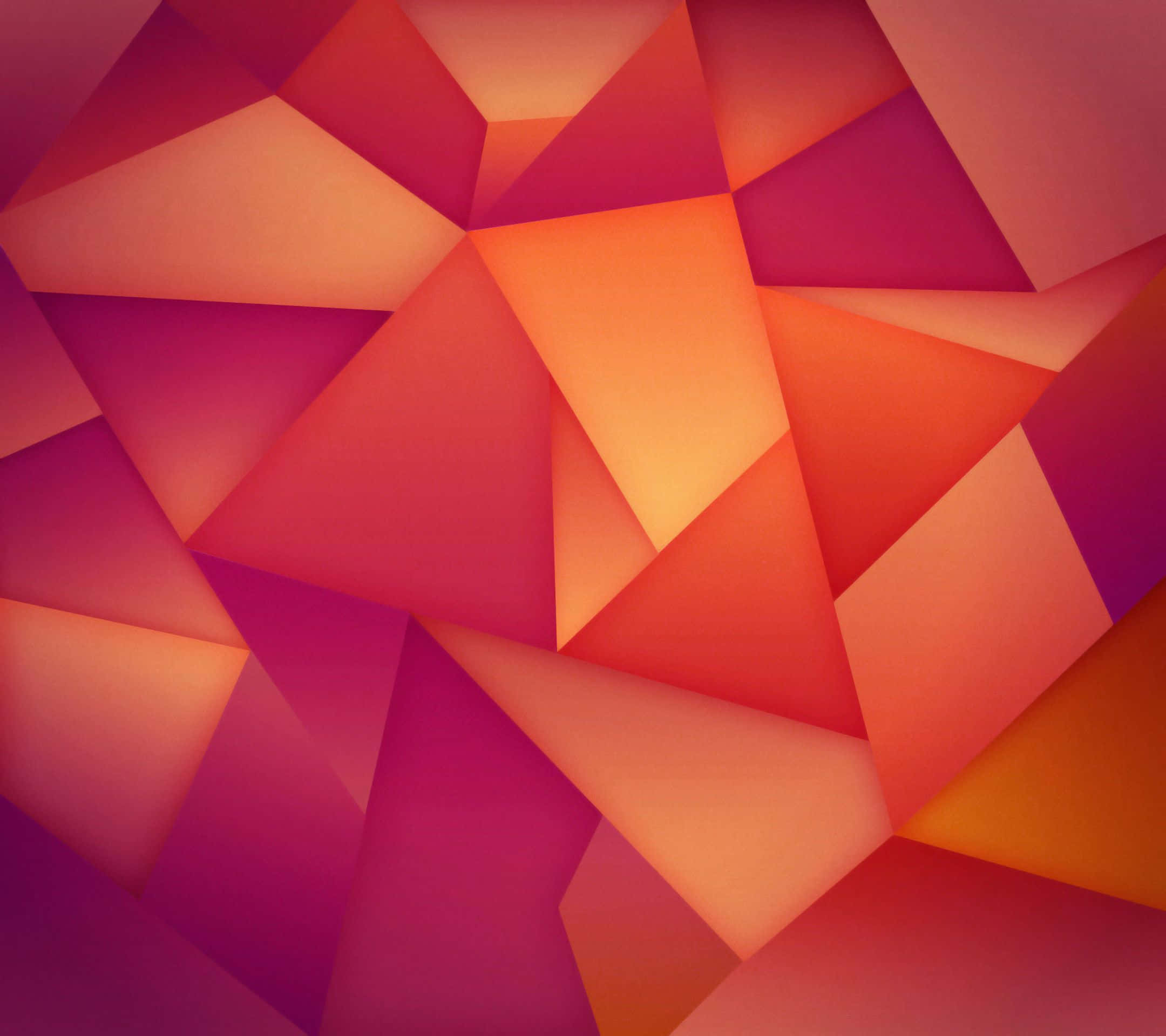 triangle 桌布 壁紙 — 充滿活力的幾何三角形，採用洋紅色、橙色和紅色的暖色漸變色調，營造出動態的抽象構圖。