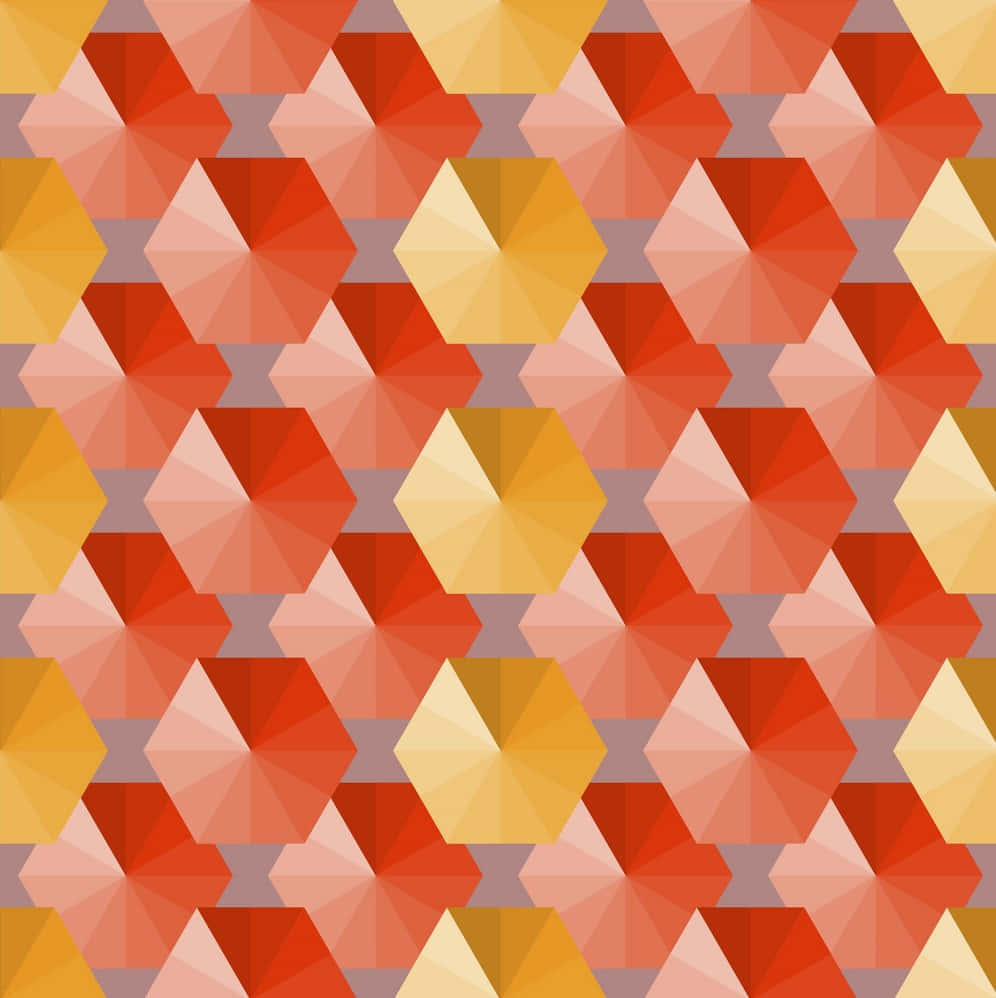 Red And Yellow 桌布 壁紙 — 充滿活力的幾何六邊形圖案，採用溫暖的秋日色調，包括紅色、橙色和黃色。