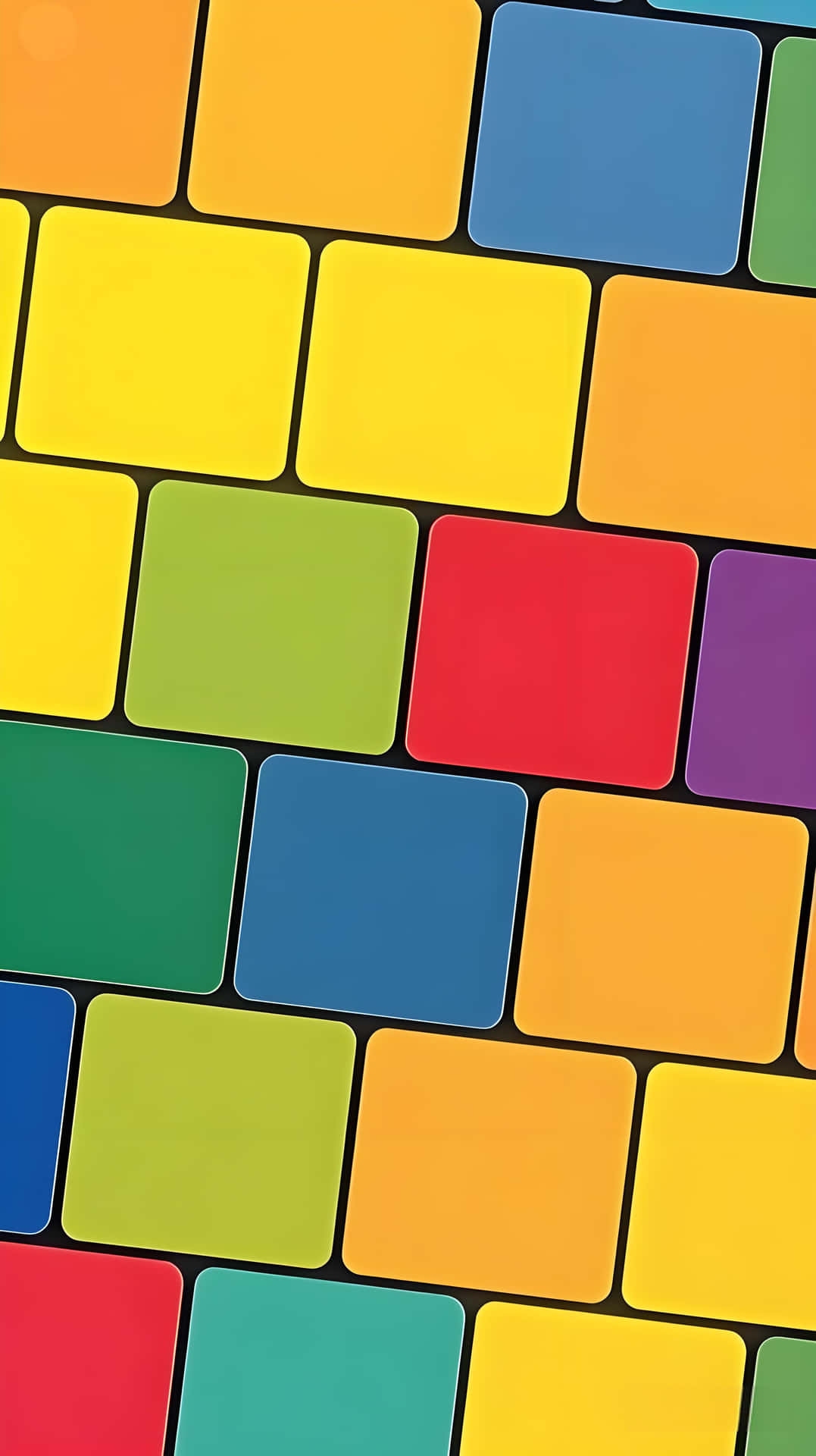 Colorful Brick Wall Wallpaper 壁紙 — 充滿活力的彩色方塊以彩虹色調排列成動態重疊圖案。
