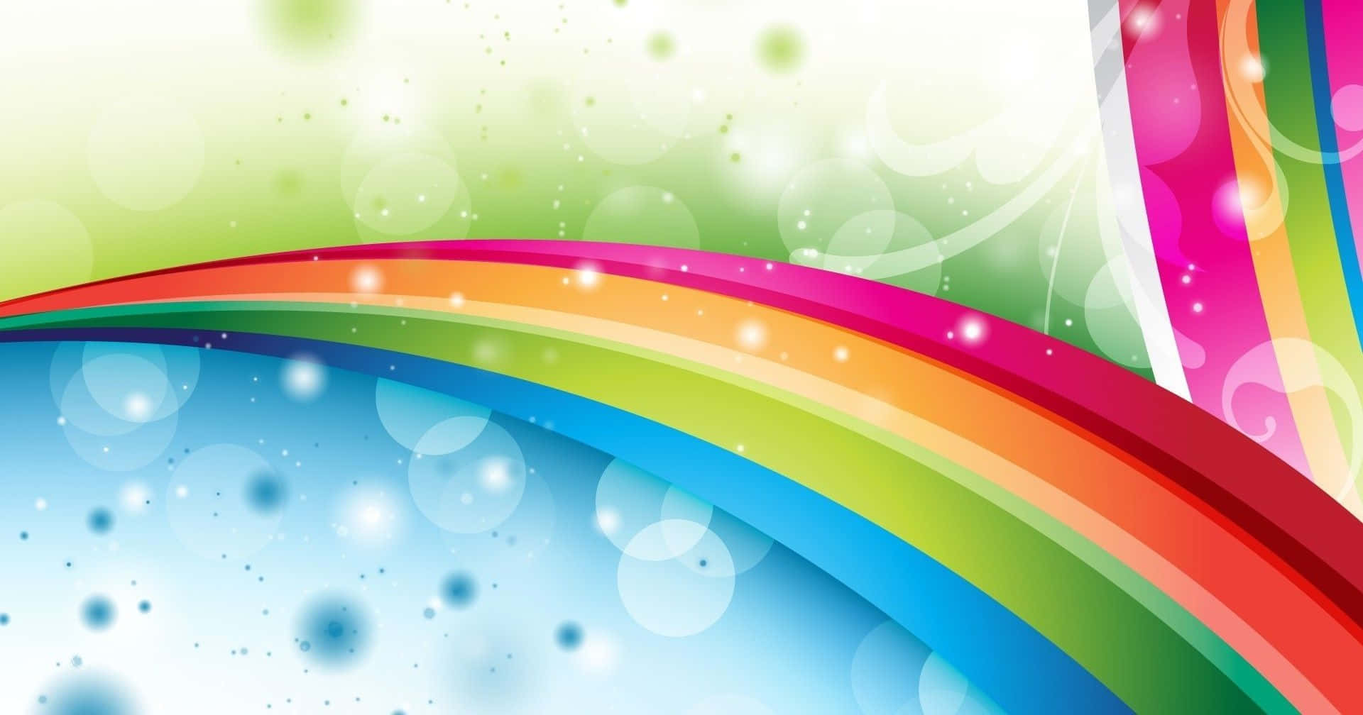 Rainbow Colours 桌布 壁紙 — 充滿活力的彩虹弧線掠過柔和的漸變背景，帶有閃爍的散景燈光和旋轉圖案。