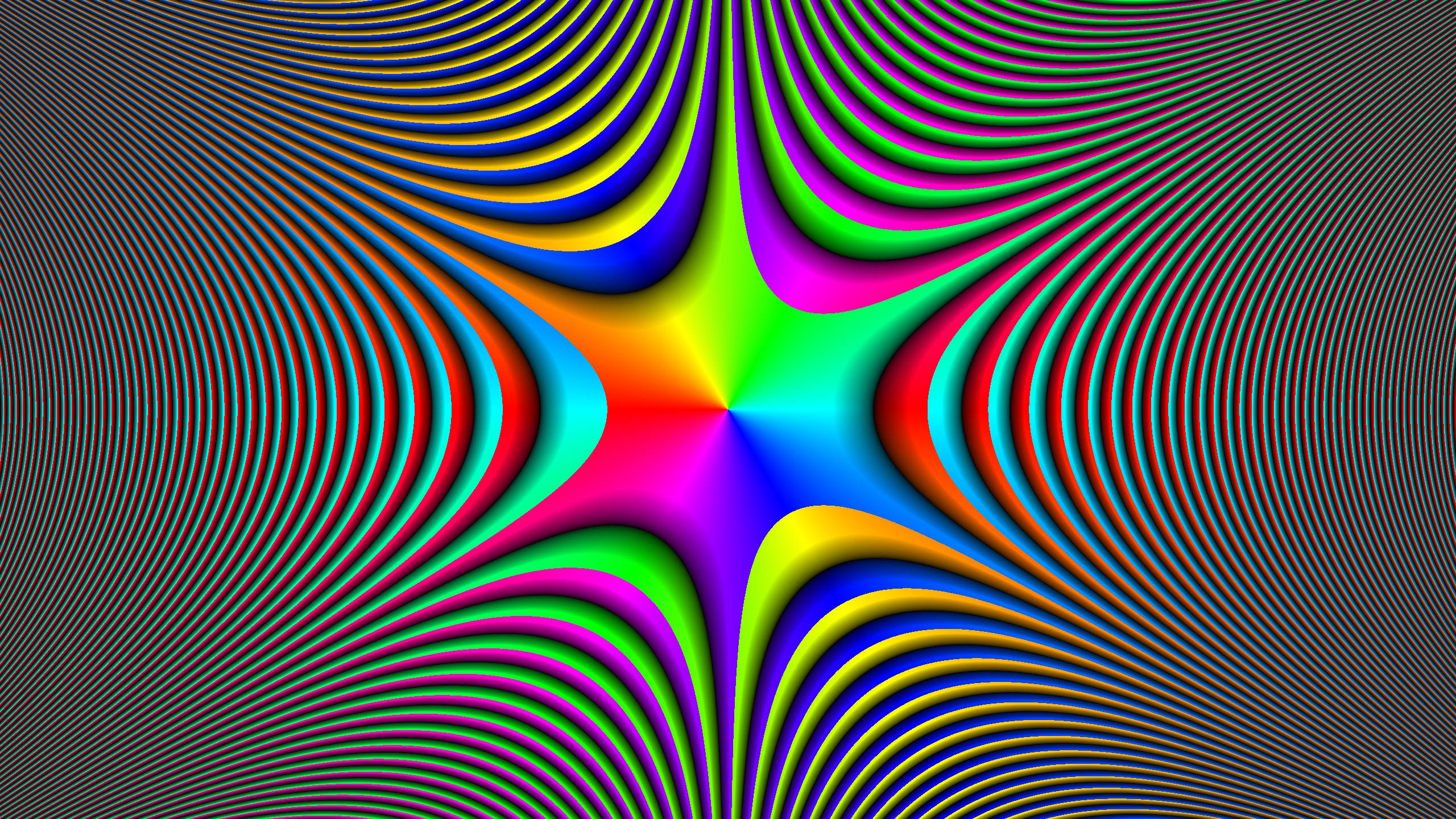 Illusion 桌布 壁紙 — 充滿活力的彩虹星爆從中心輻射出來，在深灰色背景上形成催眠般的同心波紋。