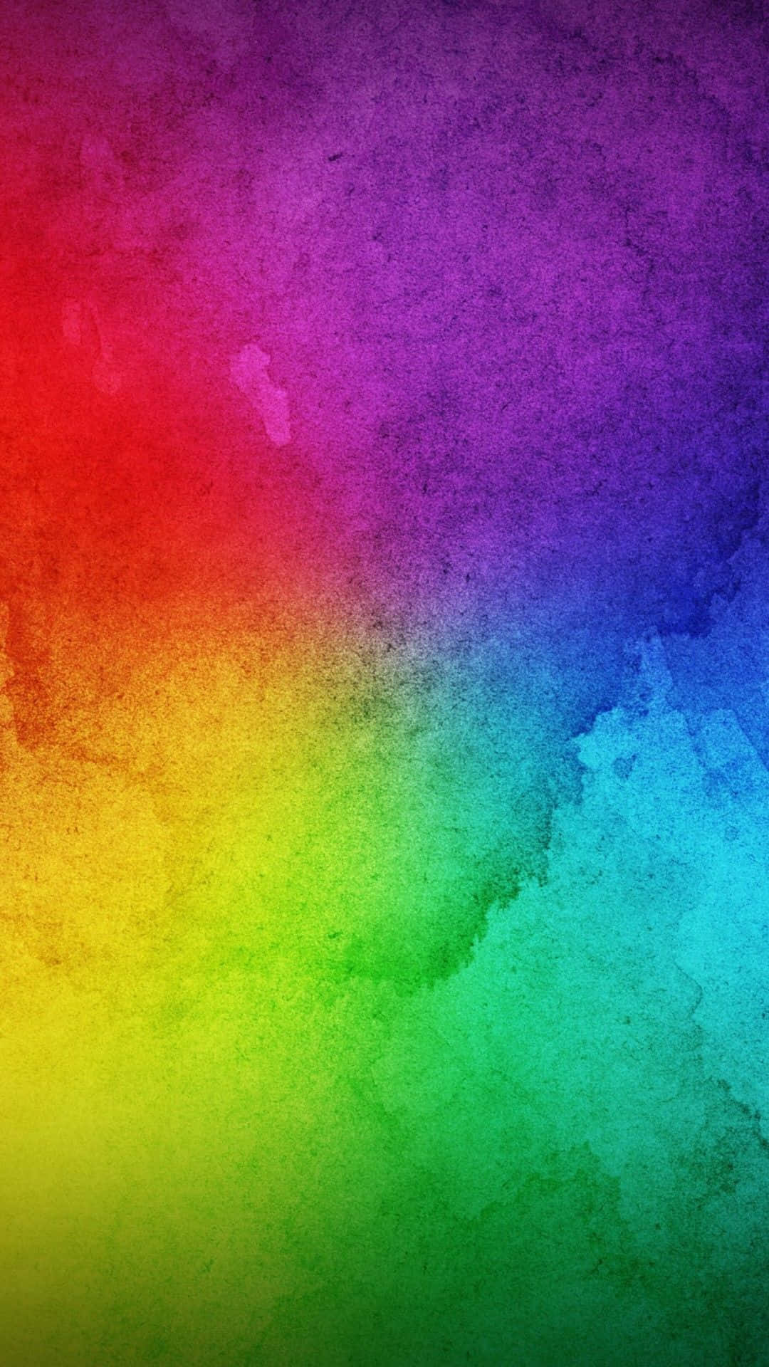 colors 桌布 壁紙 — 充滿活力的彩虹水彩漸變，帶有紋理筆觸，在畫布上從紅色過渡到紫色。