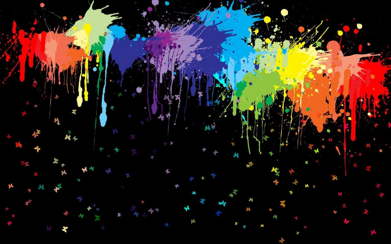 Paint Splatter 桌布 壁紙 — 充滿活力的彩虹油漆飛濺在黑色背景上，散落著色彩繽紛的蝴蝶。