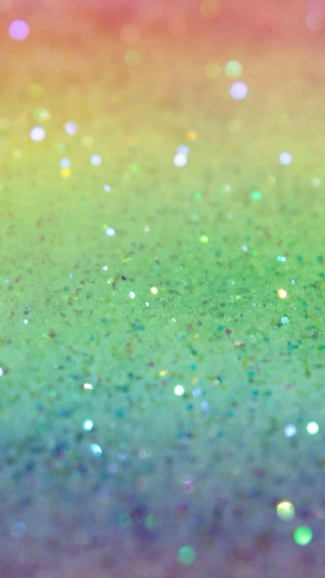 Rainbow Glitter 桌布 壁紙 — 充滿活力的彩虹漸變色，點綴著閃爍的亮粉顆粒，營造出神奇的閃爍效果。