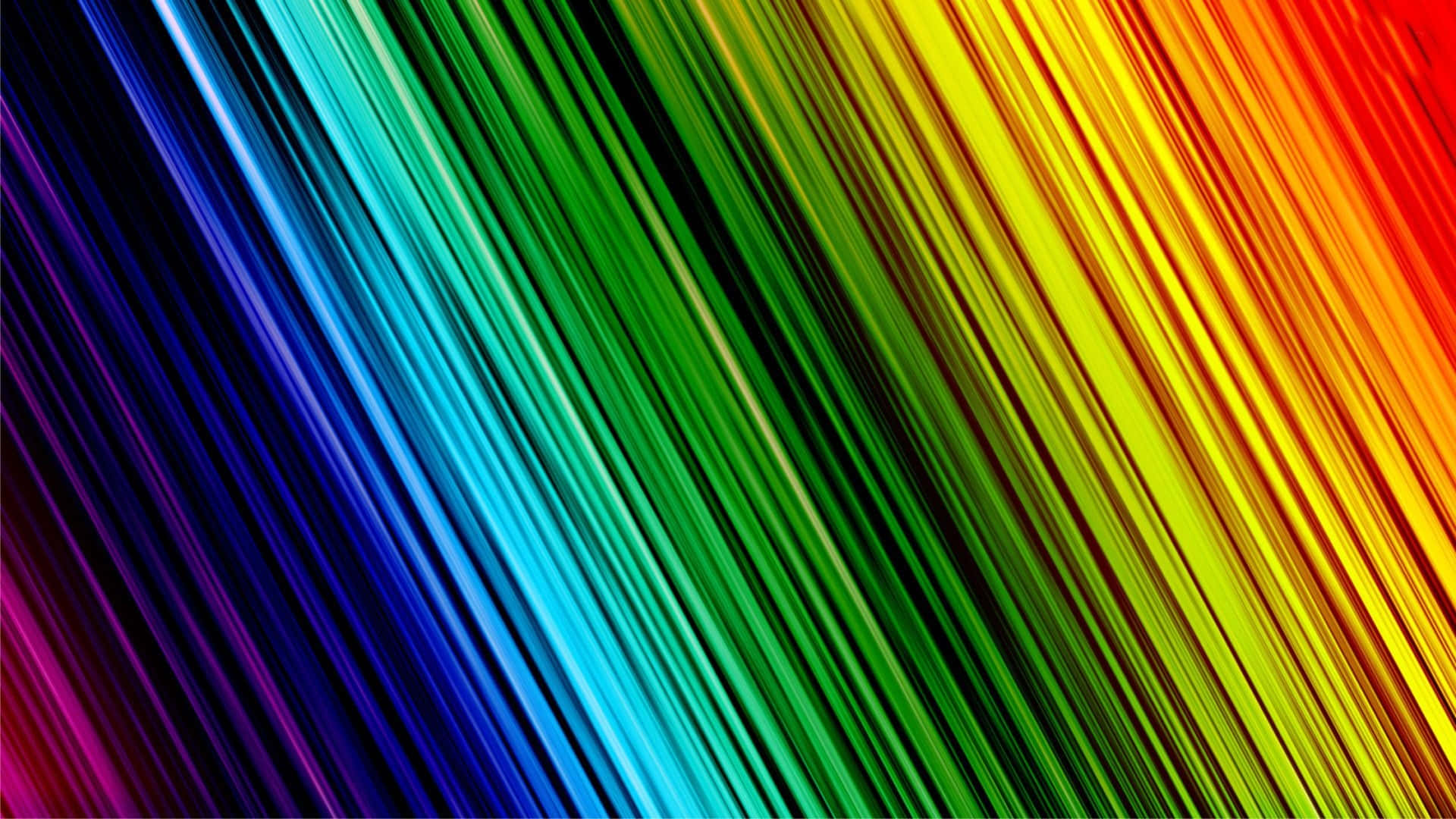 Neon Colors 桌布 壁紙 — 充滿活力的彩虹色對角線條在動態抽象圖案中流過畫面。