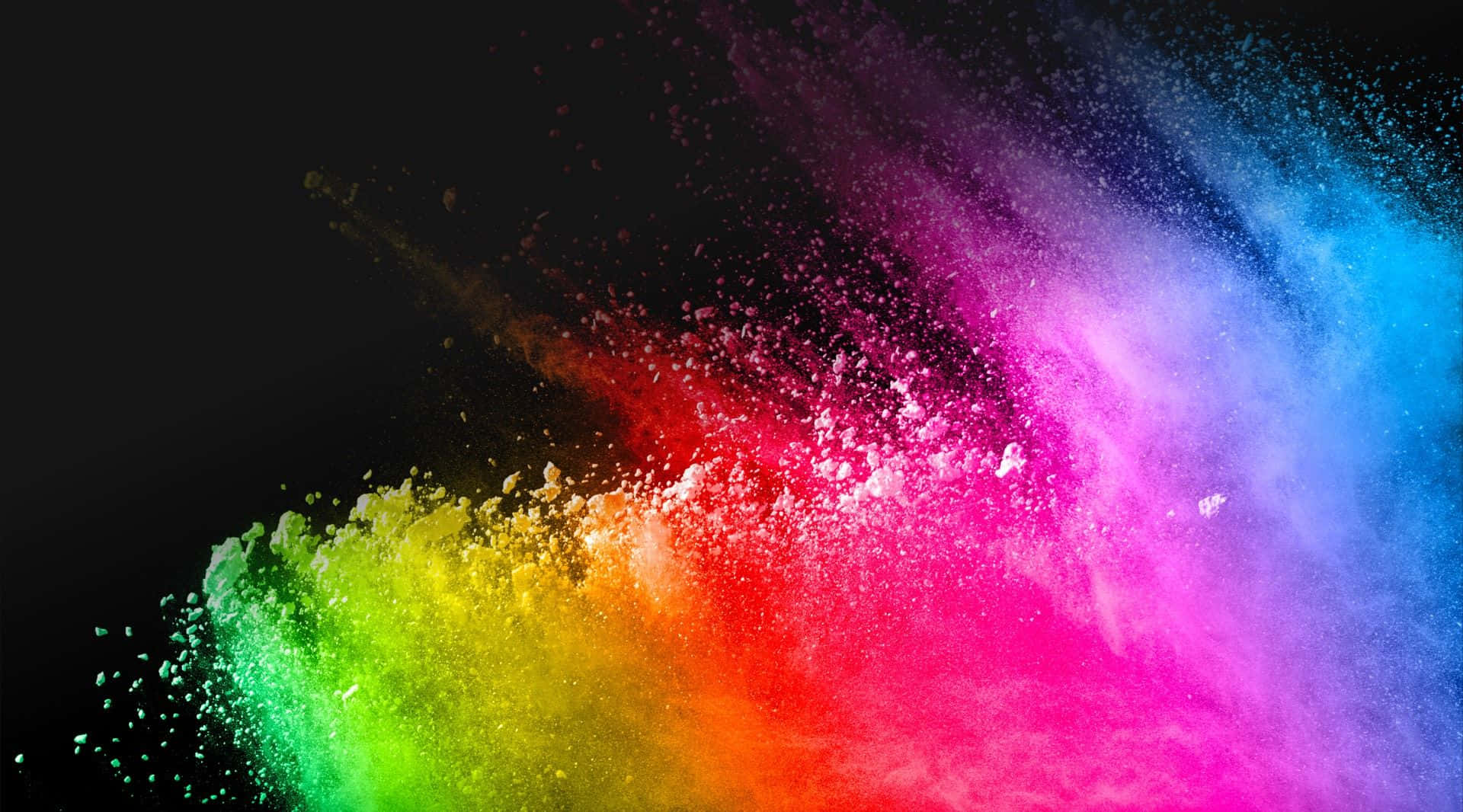 HD Oled 桌布 壁紙 — 充滿活力的彩虹色粉末在純黑色背景上動態爆炸，產生鮮豔色彩的爆發。