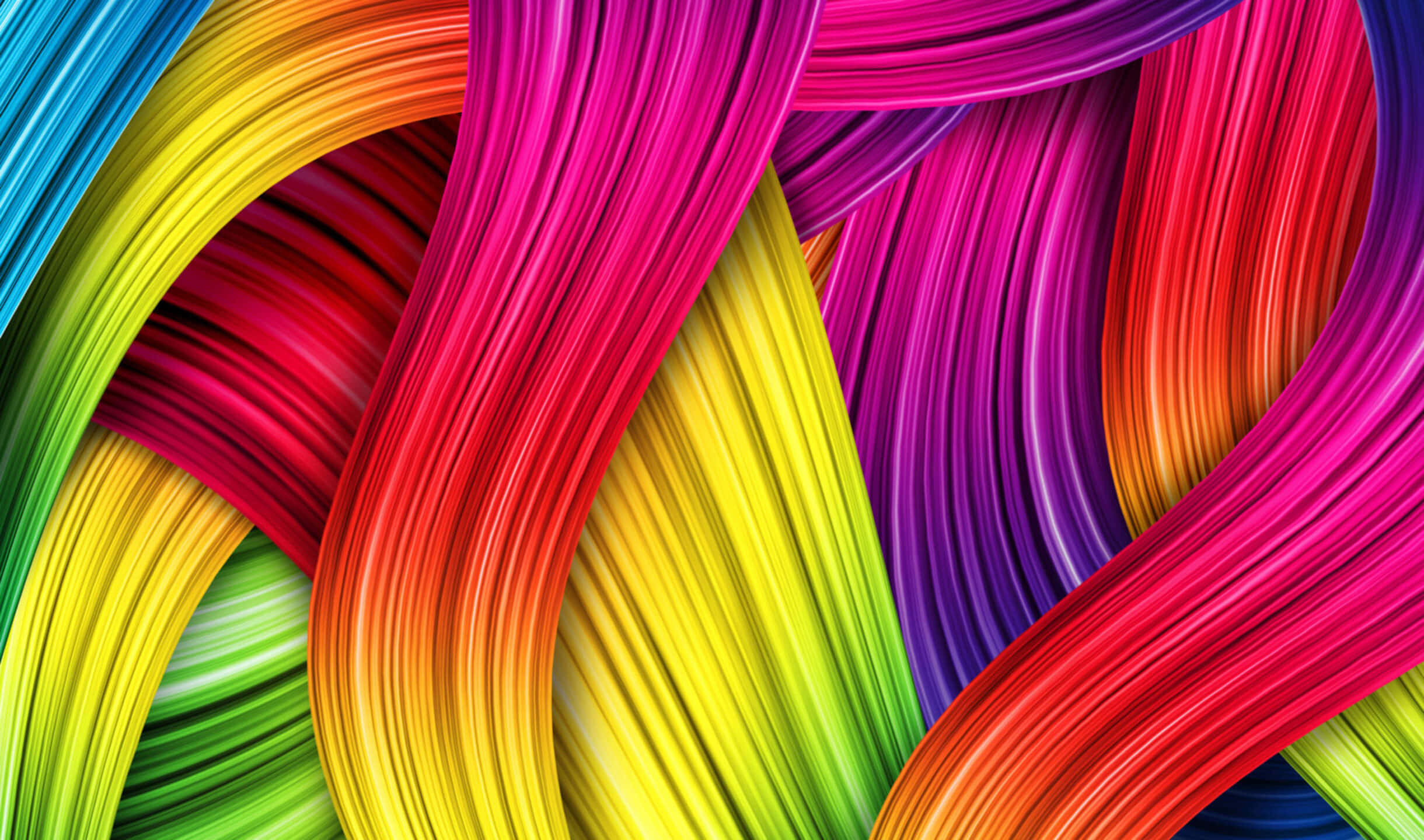 Colorful Aesthetic 桌布 壁紙 — 充滿活力的彩虹色絲帶在動態抽象圖案中扭動流動，帶有光澤亮點。