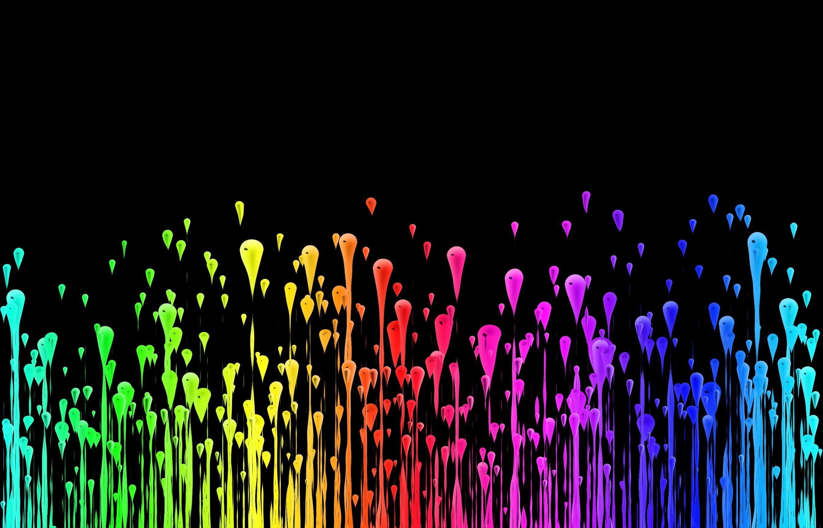 paint 桌布 壁紙 — 充滿活力的彩虹顏料飛濺在純黑色背景上動態升起，創造出鮮豔的抽象色彩爆炸。