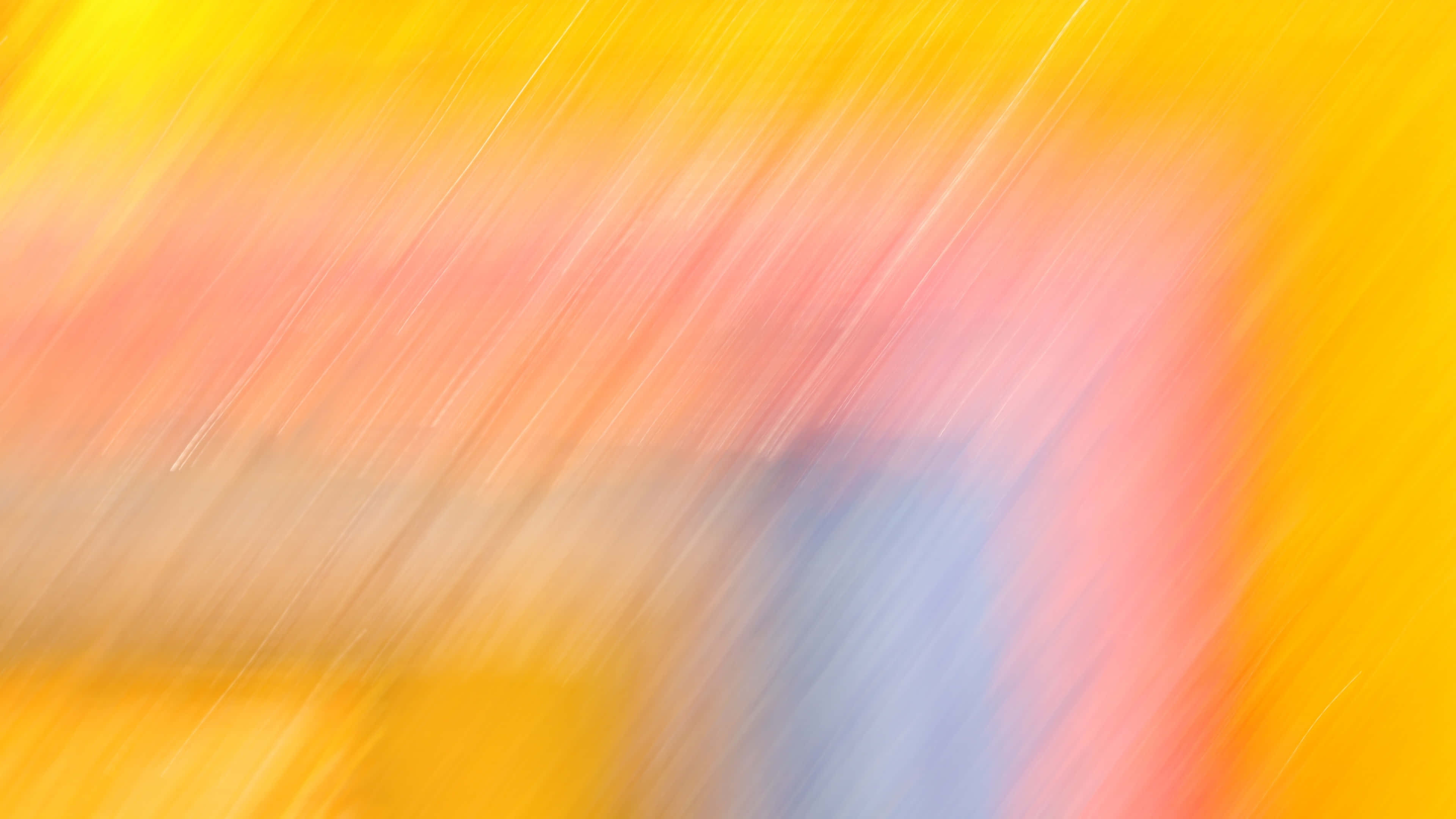 Bright Color 桌布 壁紙 — 充滿活力的抽象動態模糊條紋，黃色、橙色和藍色，營造出動感十足、充滿能量的視覺效果。