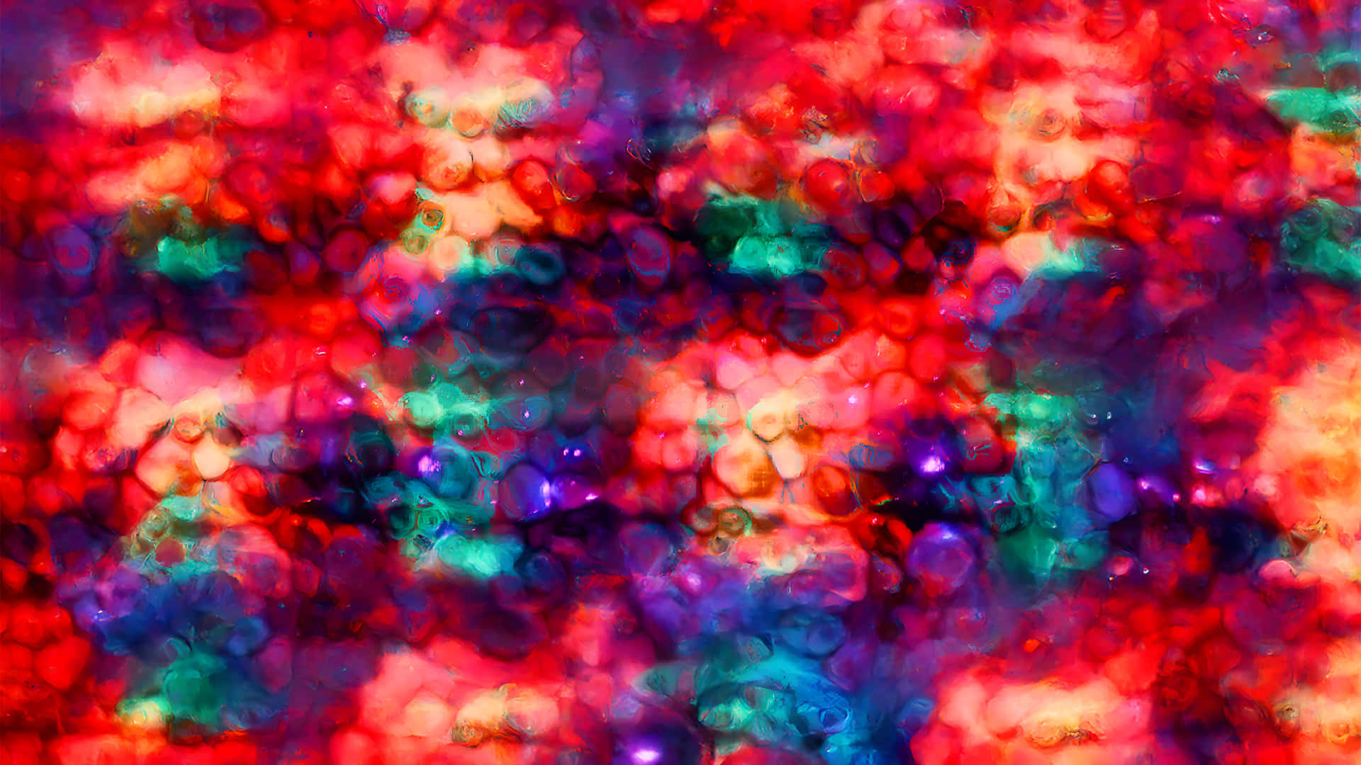 Call of Duty Black Ops 6 Nebula Camo (Wallpaper) 壁紙 — 充滿活力的抽象圖案，旋轉的紅色、藍綠色和紫色，帶有發光的氣泡狀紋理。