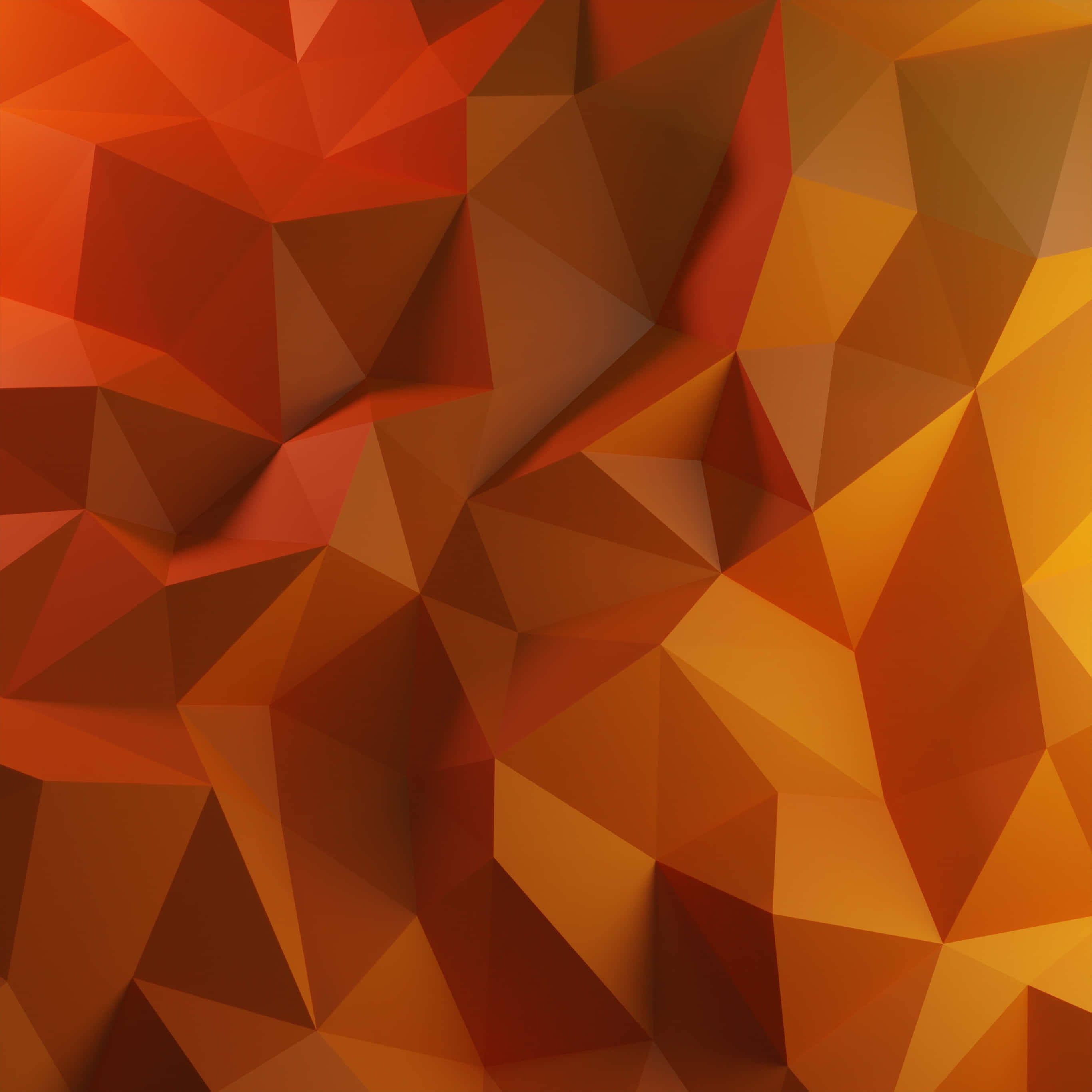 Red And Orange 桌布 壁紙 — 充滿活力的抽象圖案，由橙色和紅色三角形交織而成，形成動態的低多邊形紋理。