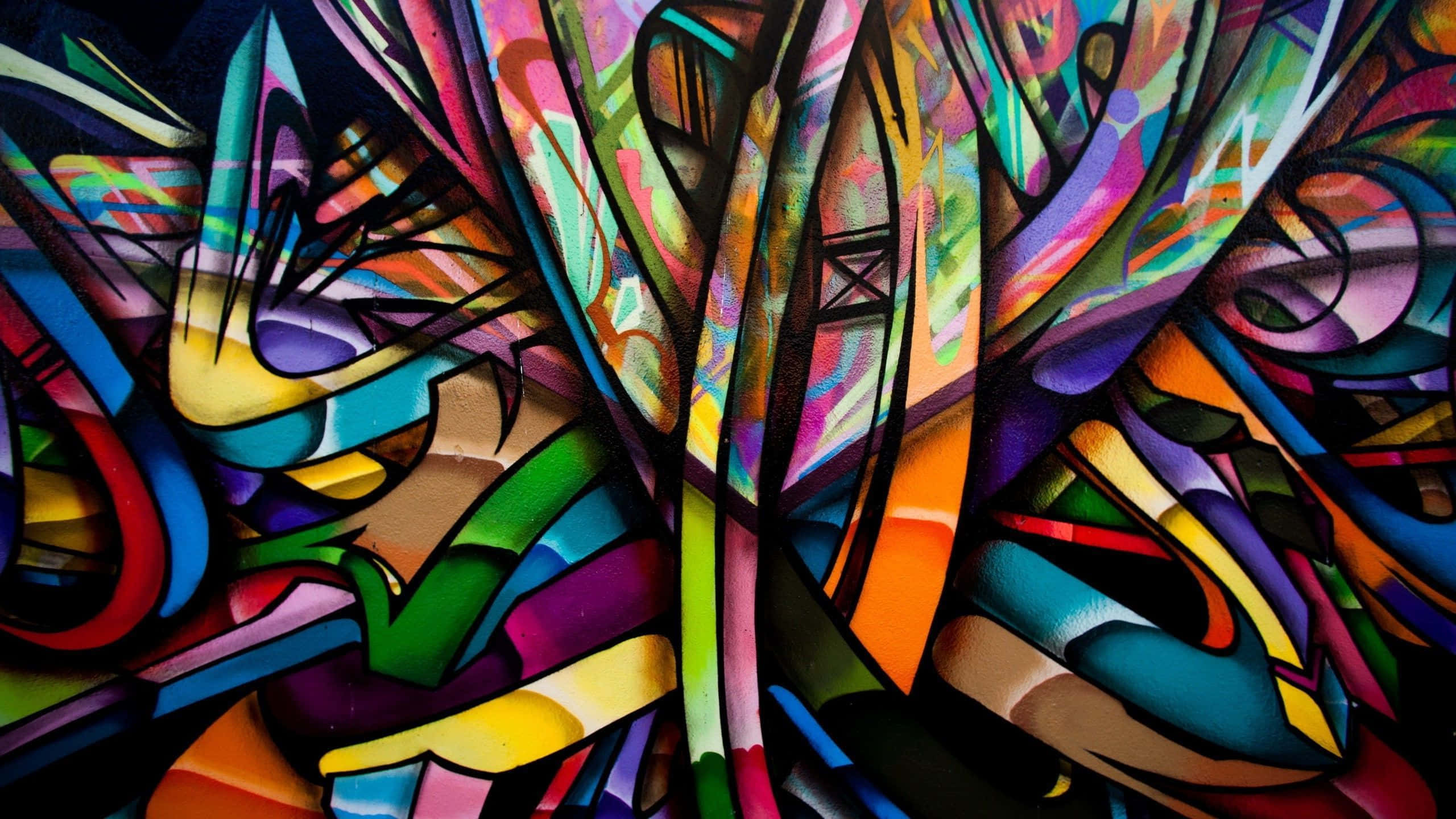 Colorful Abstract Art 桌布 壁紙 — 充滿活力的抽象塗鴉藝術在深色背景上迸發出大膽的色彩和動態的形狀。