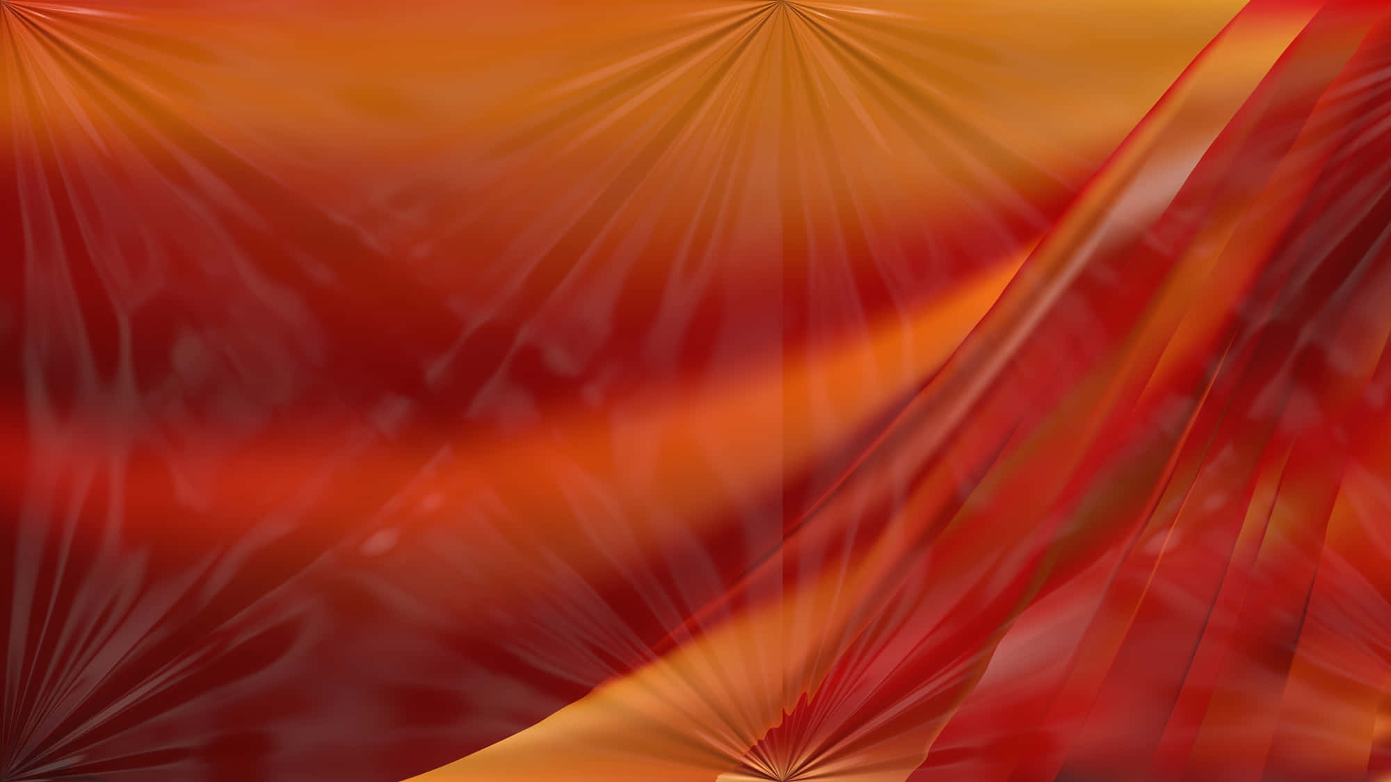 Orange Abstract 桌布 壁紙 — 充滿活力的抽象布料褶皺，以火紅和橙色從中心點輻射，形成動態流動的圖案。
