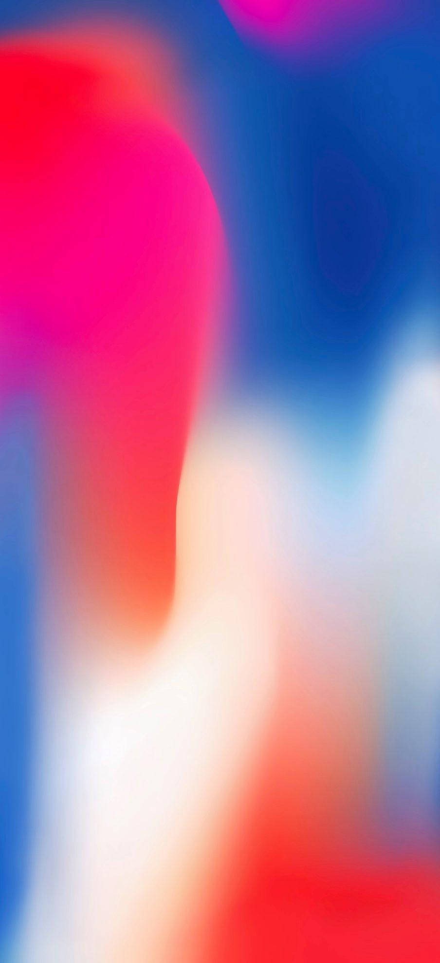 iPhone 動態 桌布 壁紙 — 充滿活力的抽象模糊效果，紅色、藍色和白色在柔和的漸變中流動在一起。