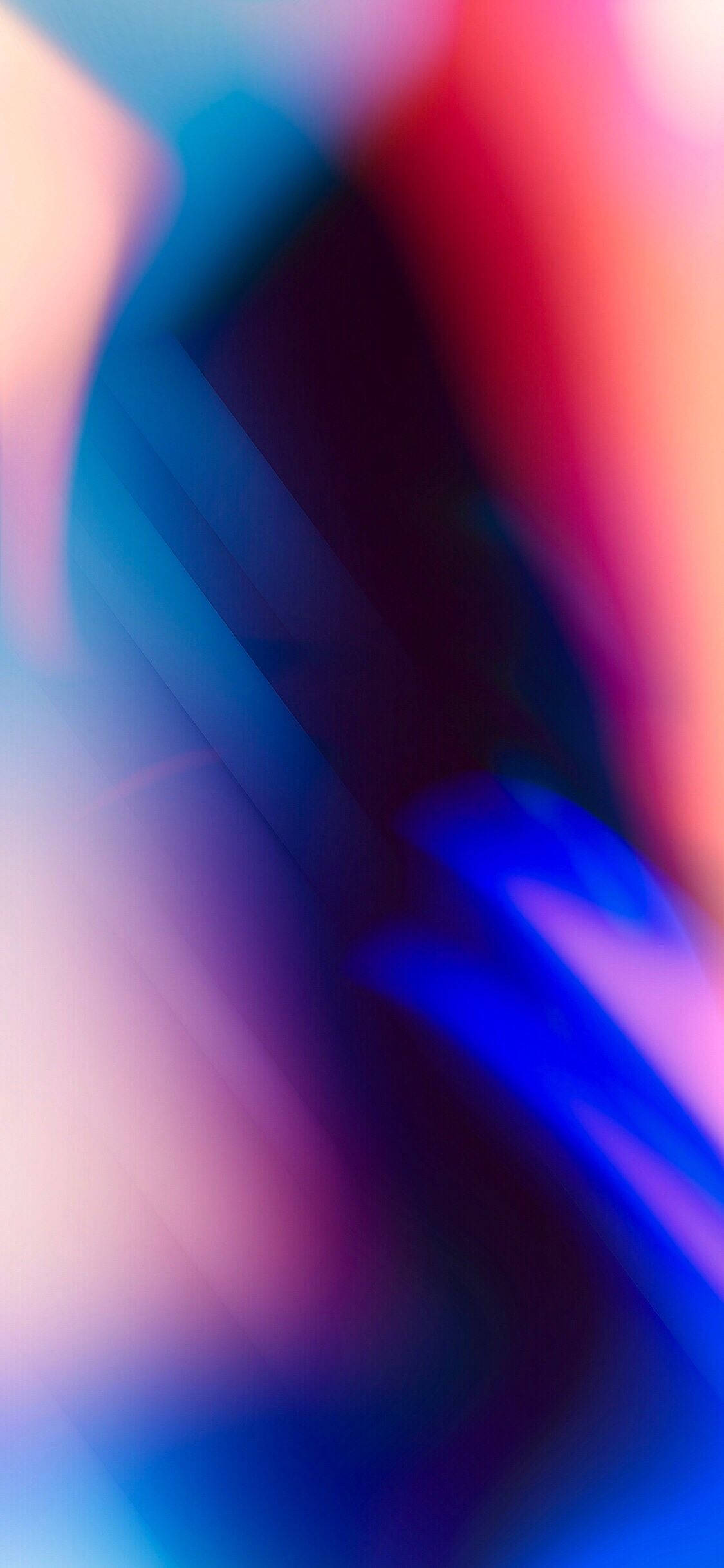 iPhone 桌布 壁紙 — 充滿活力的抽象模糊效果，電光藍、粉紅和紅色條紋沿對角線流過畫面。