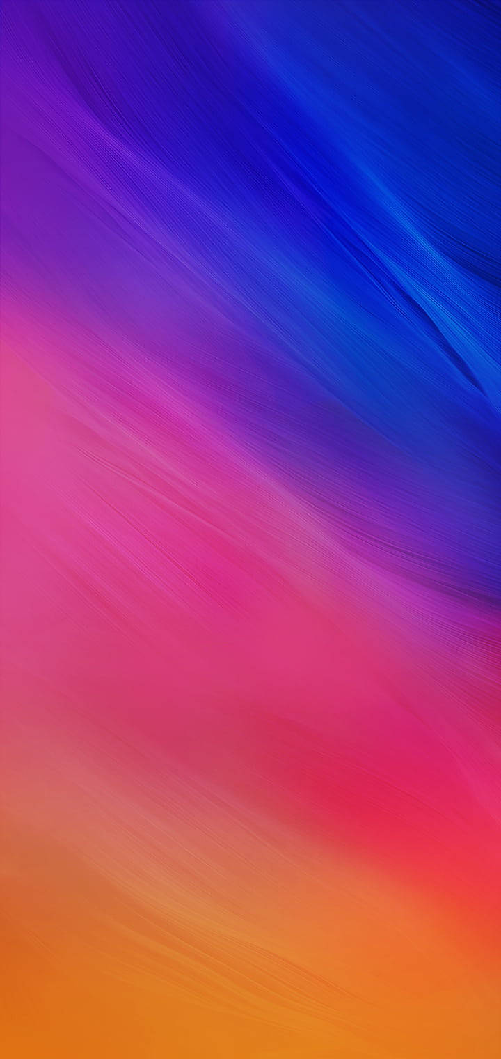 Gradient 桌布 壁紙 — 充滿活力的抽象漸層從電光藍過渡到火熱橙，帶有柔和的洋紅色條紋。