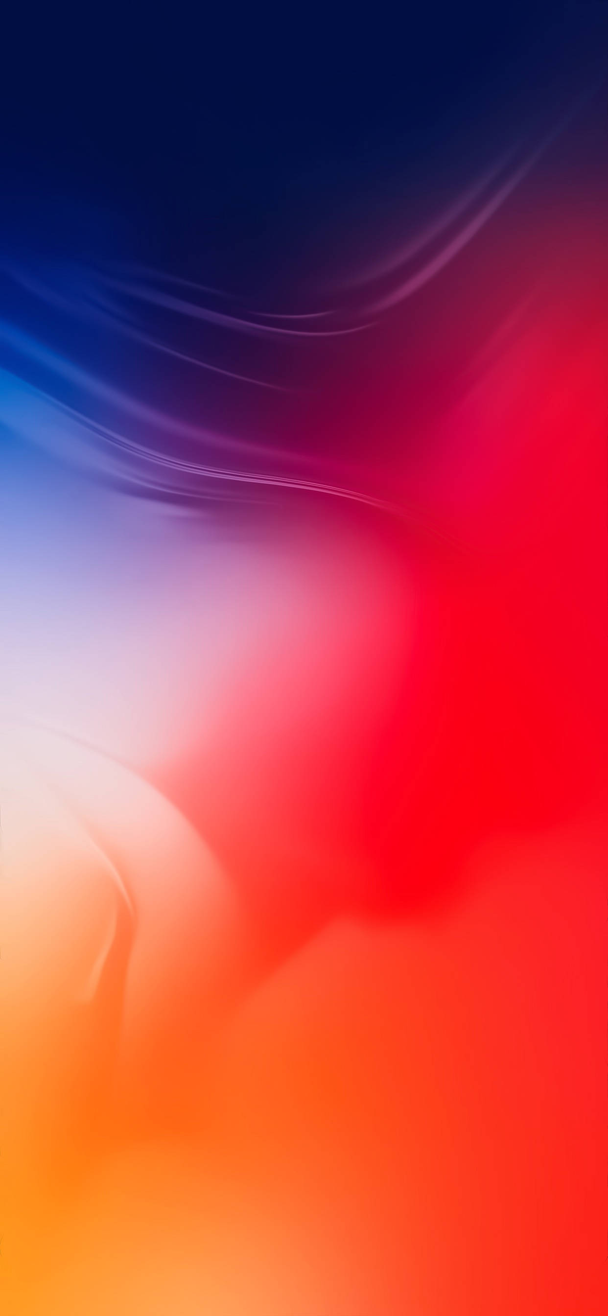 iOS 13 桌布 壁紙 — 充滿活力的抽象漸變，從深藍色過渡到火紅色和溫暖的橙色，帶有柔和發光的曲線。