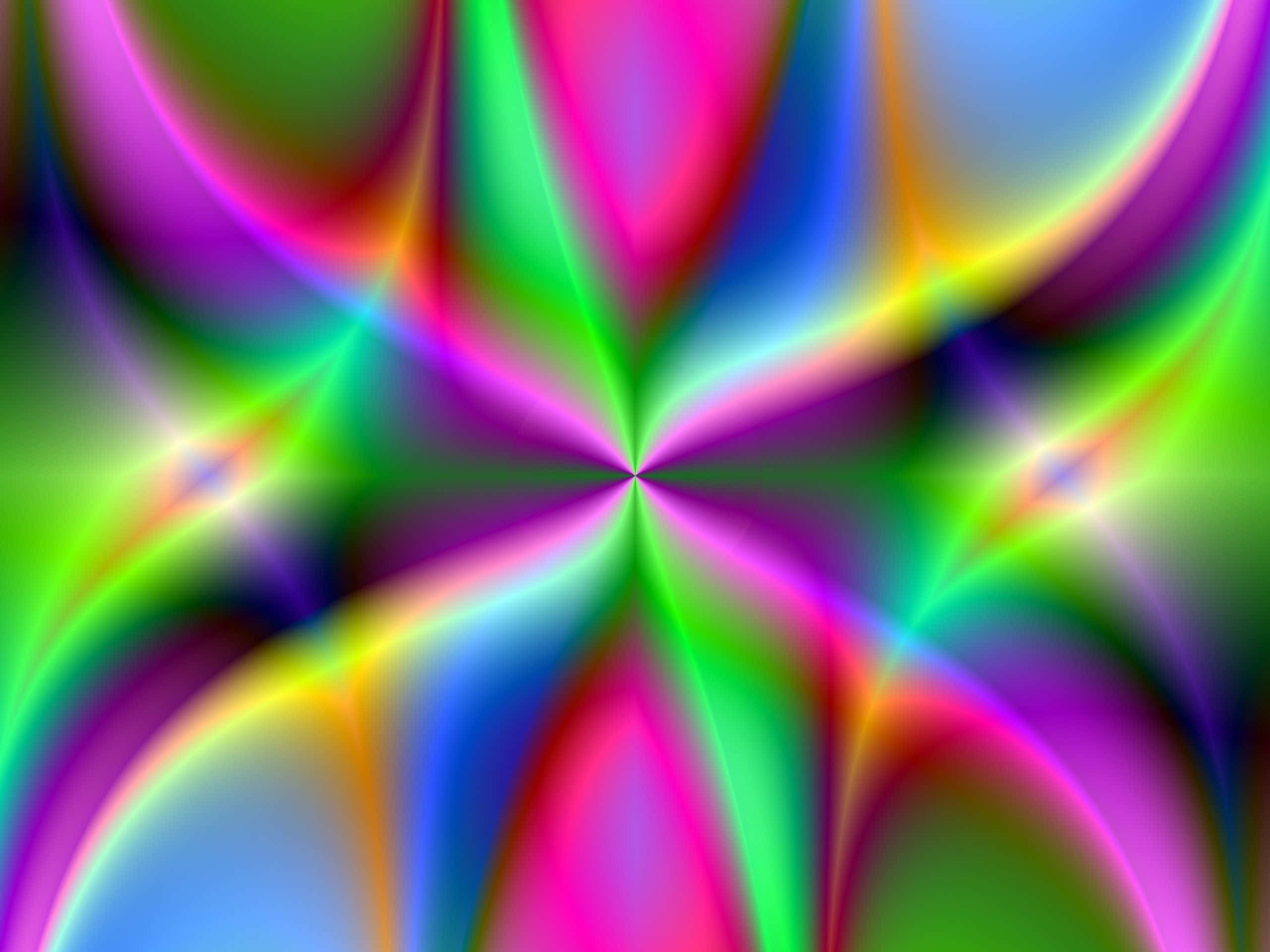 Neon Colors 桌布 壁紙 — 充滿活力的抽象碎形圖案從中心向外輻射，帶有粉紅、綠、藍和黃色的霓虹漸層。