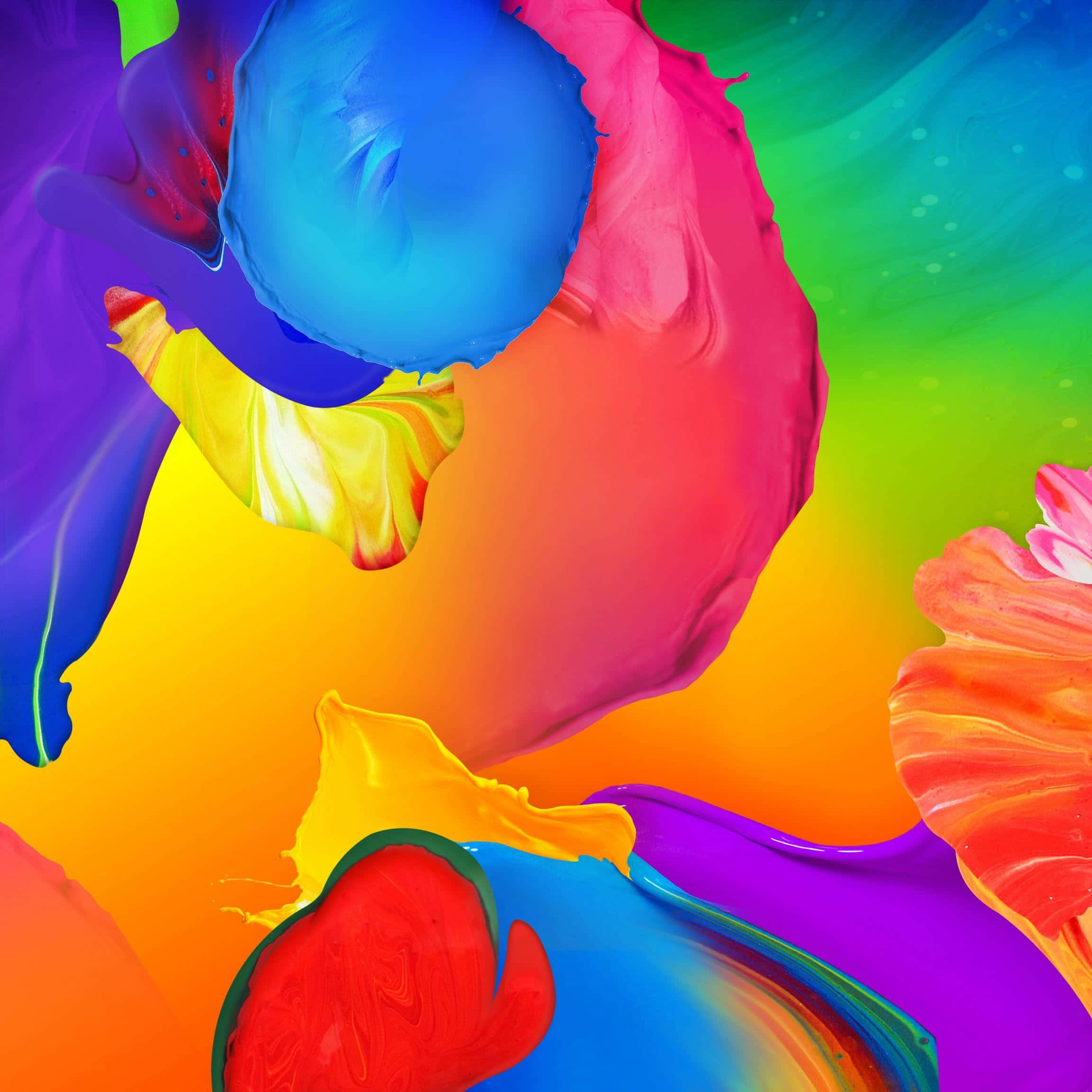 Multicolor 桌布 壁紙 — 充滿活力的旋轉油漆斑點，以電光藍、粉紅、黃色和紫色在漸變背景上動態融合。