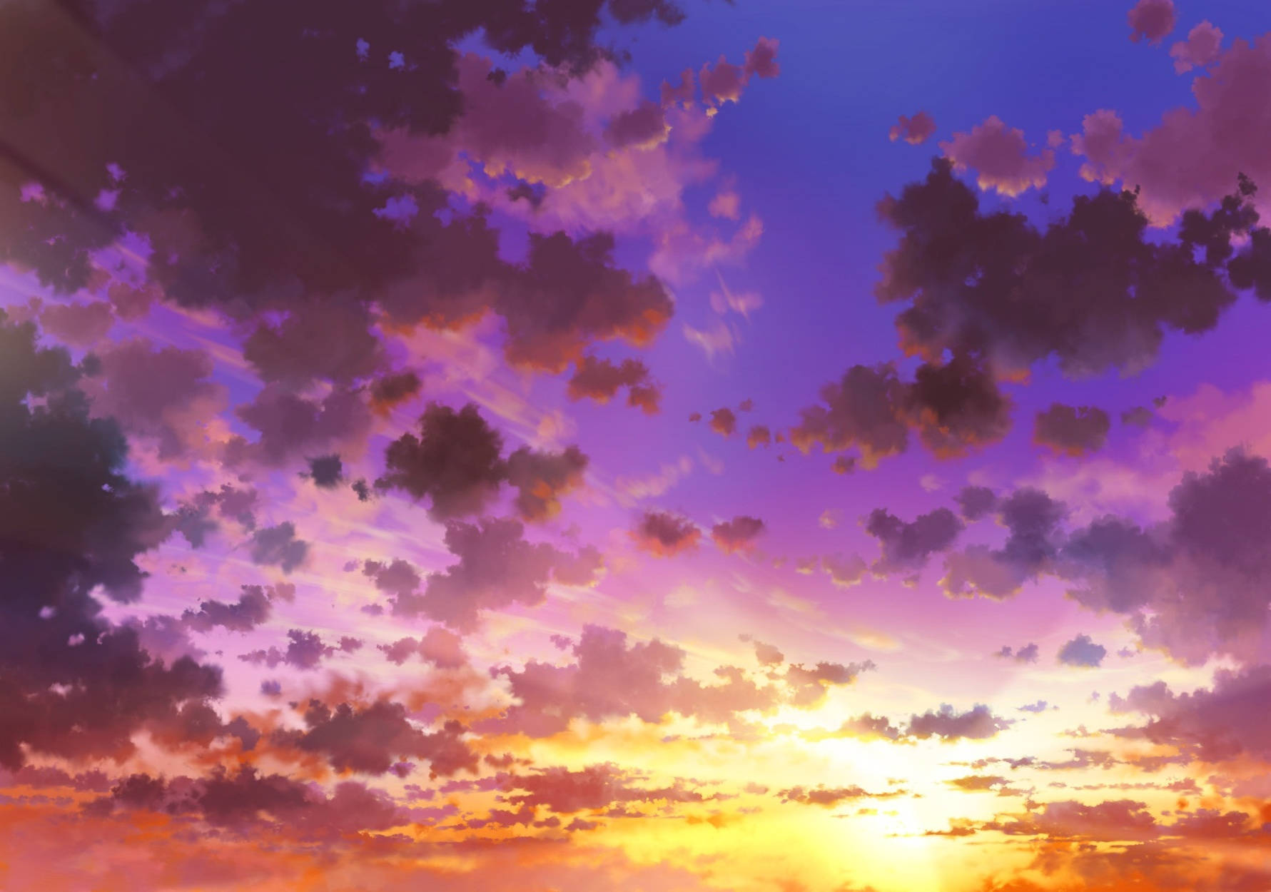 夕陽天空 桌布 壁紙 — 充滿活力的日落天空，塗上紫色、橙色和黃色的雲彩，在深藍色的地平線上發光。