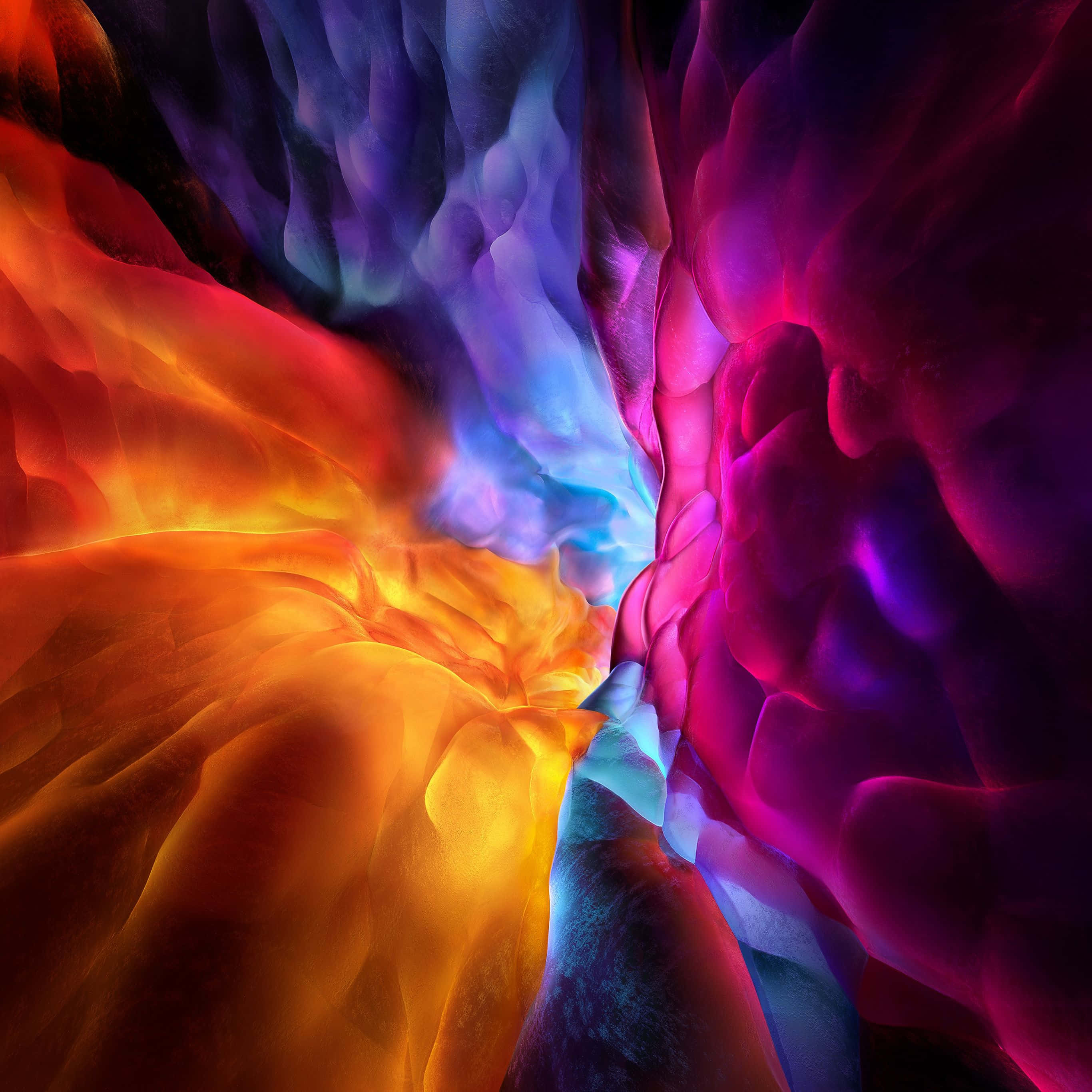 Cool Abstract 桌布 壁紙 — 充滿活力的橙色、粉紅色和藍色漩渦色彩，像液體光線在宇宙隧道中流動。