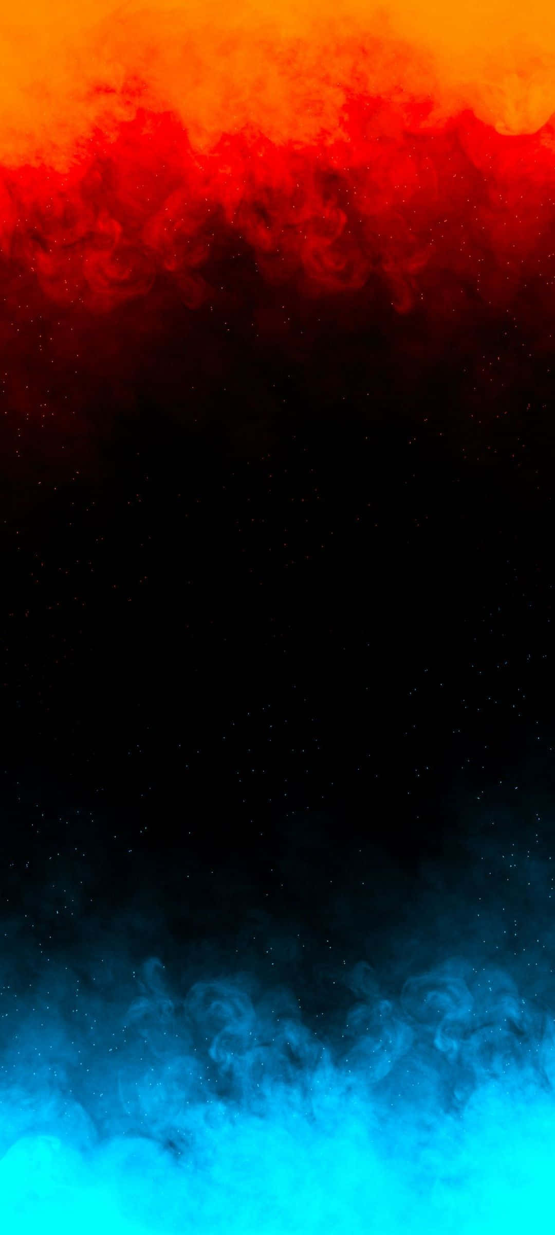 Colorful Smoke 桌布 壁紙 — 充滿活力的橙色和紅色煙霧在佈滿星星的黑色虛空上方翻騰，與下方冰冷的藍色煙霧相遇，形成戲劇性的宇宙漸變。