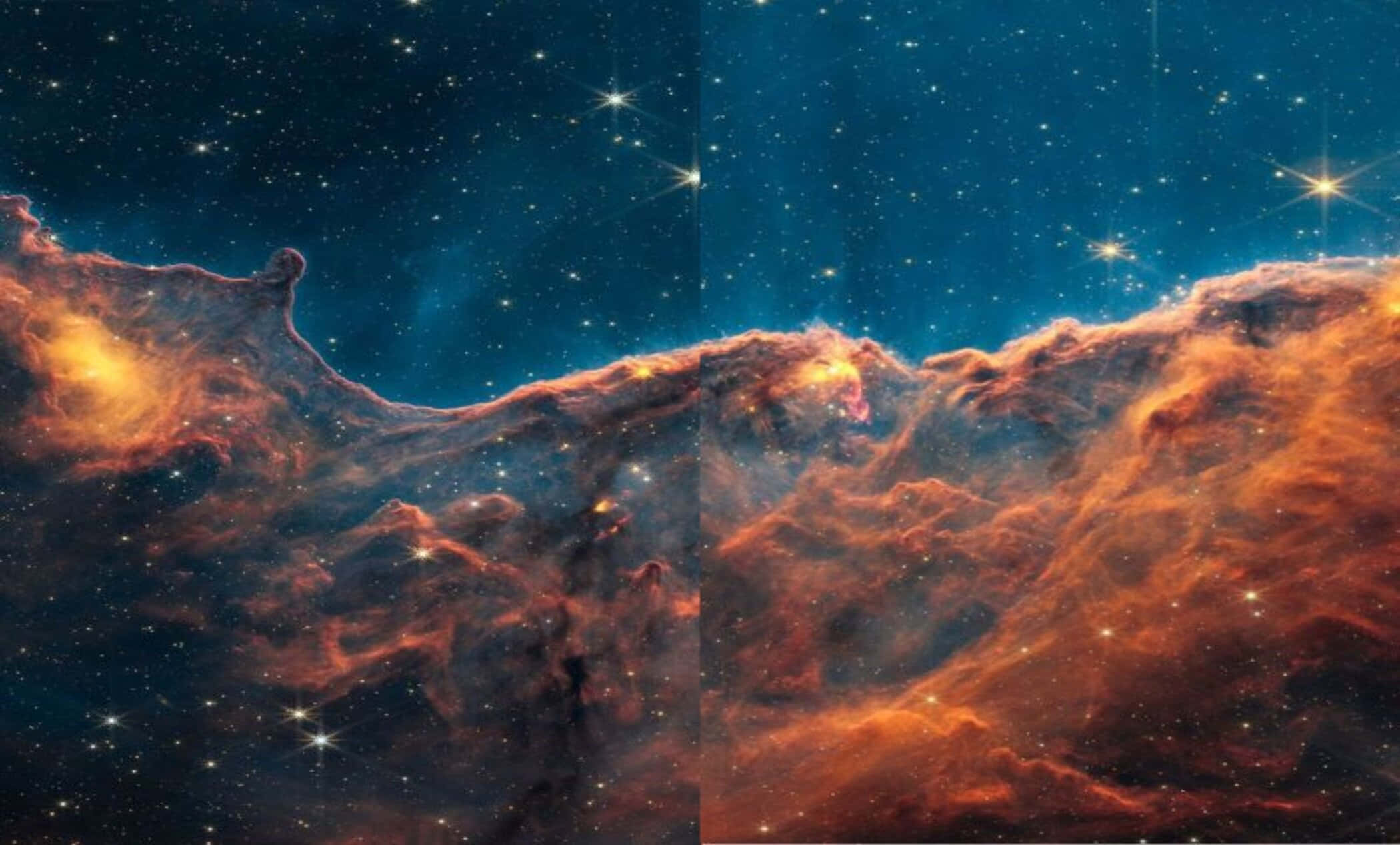 銀河 桌布 壁紙 — 充滿活力的橙色和藍色宇宙星雲，在深空中帶有發光的星星和旋轉的氣體雲。