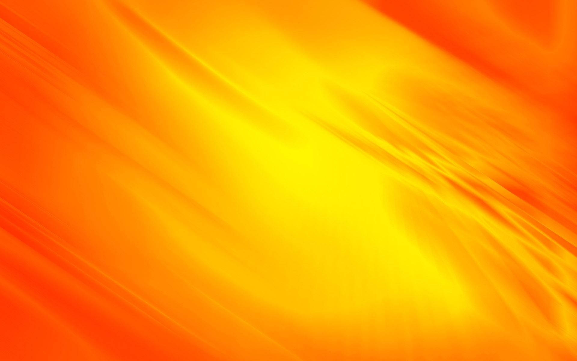 Orange And Yellow 桌布 壁紙 — 充滿活力的橙色和黃色抽象漩渦，像熔化的光一樣流動放射。