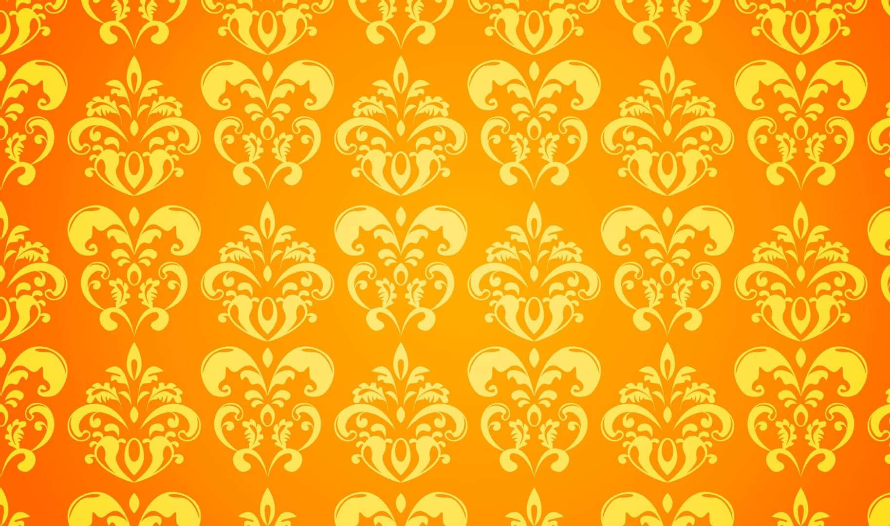 Yellow Pattern 桌布 壁紙 — 充滿活力的橙色漸層壁紙，帶有重複的金色大馬士革花卉圖案，呈對稱網格排列。