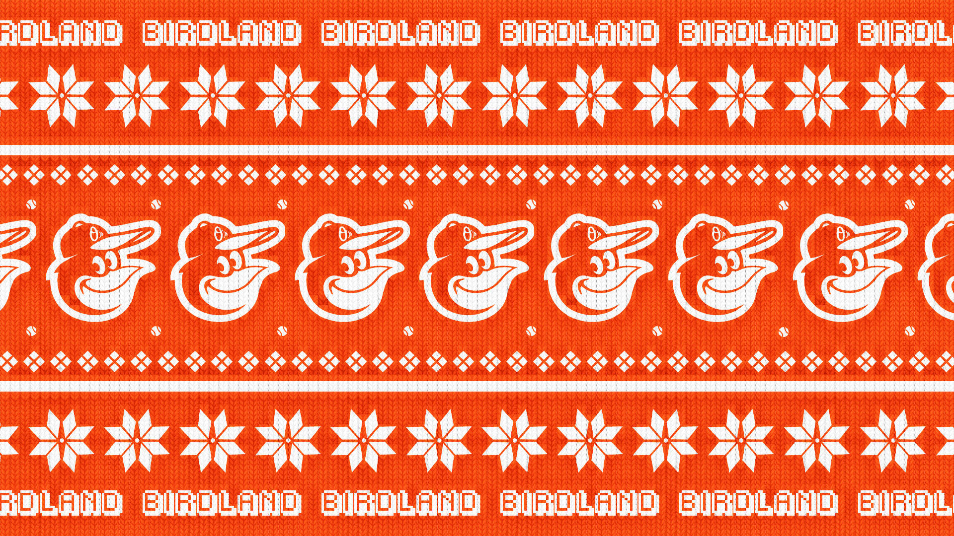 Orioles 桌布 壁紙 — 充滿活力的橙色針織圖案，帶有重複的白色鳥標誌和雪花圖案，節日風格。