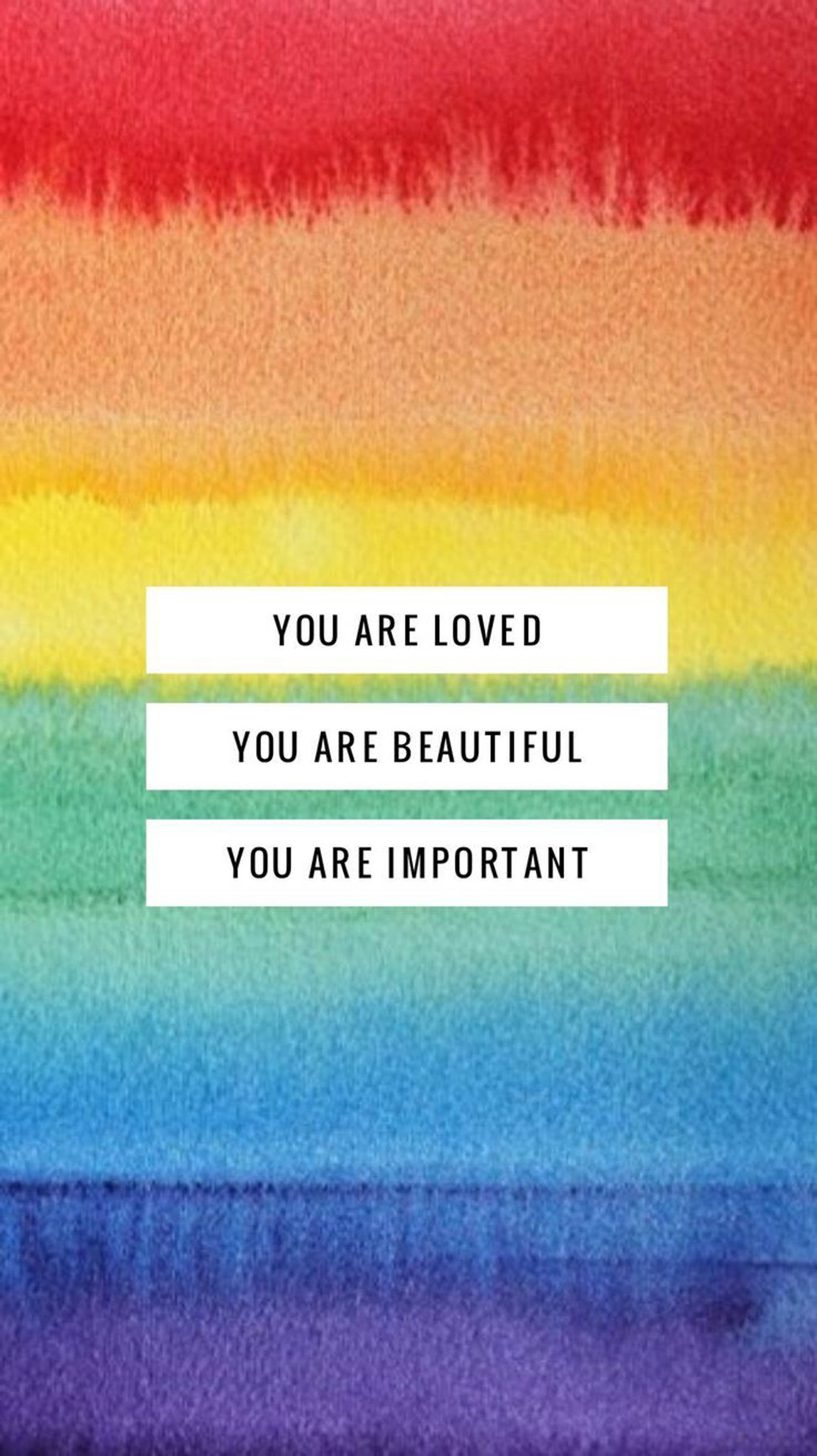 You Are Beautiful 桌布 壁紙 — 充滿活力的水彩彩虹漸變，帶有肯定文字框，宣告愛、美麗和重要性。