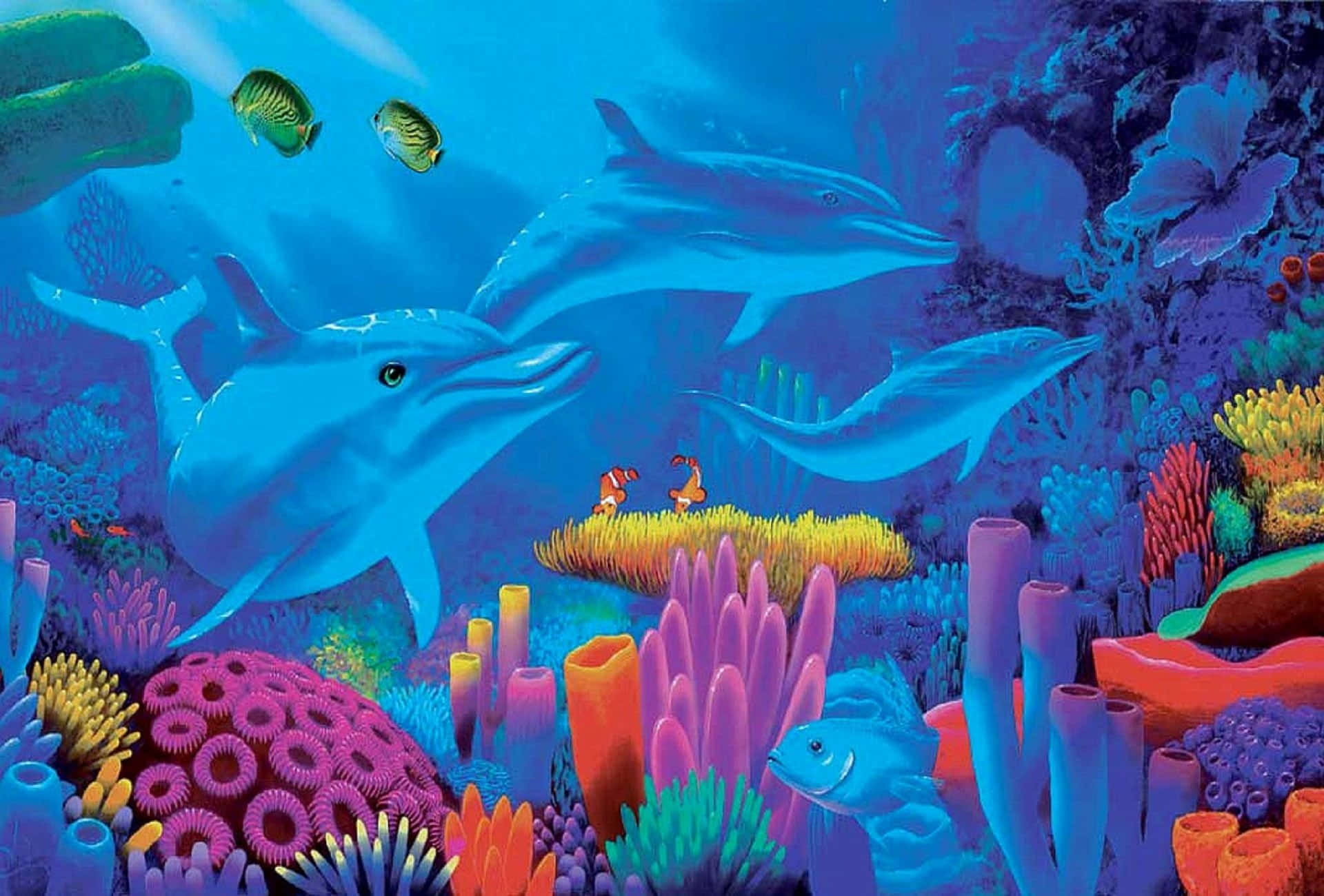 Kawaii Sea Creatures 桌布 壁紙 — 充滿活力的海底場景，海豚在色彩繽紛的珊瑚礁和熱帶魚之間游動。