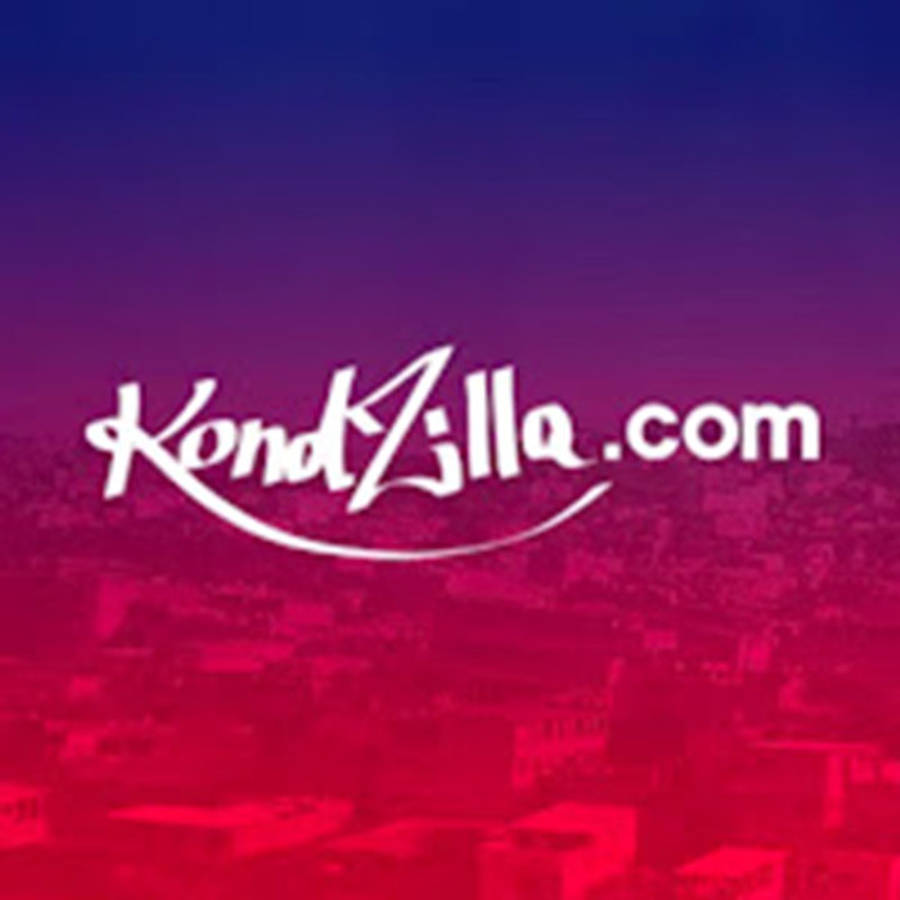 Website 桌布 壁紙 — 充滿活力的漸變天空，城市天際線剪影在醒目的白色KondZilla.com標誌下方。