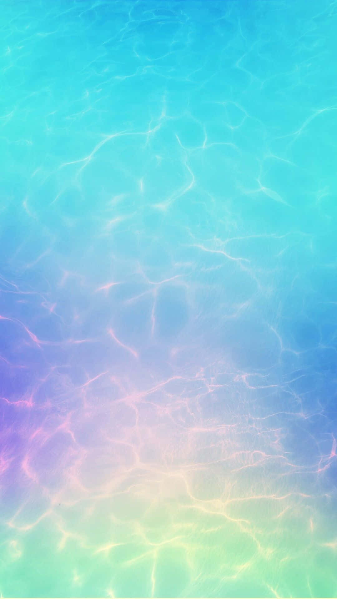 Turquoise iPhone 桌布 壁紙 — 充滿活力的漸變水波紋，採用粉彩藍、粉紅和黃色，營造出夢幻般的水下場景。