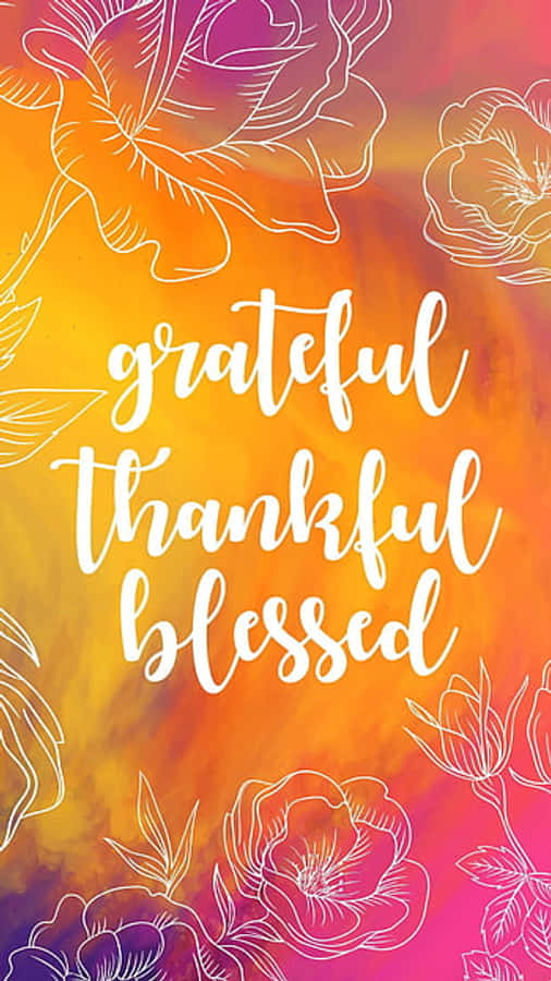 Gratitude 桌布 壁紙 — 充滿活力的漸變背景，帶有白色輪廓花朵和草書文字 grateful thankful blessed。