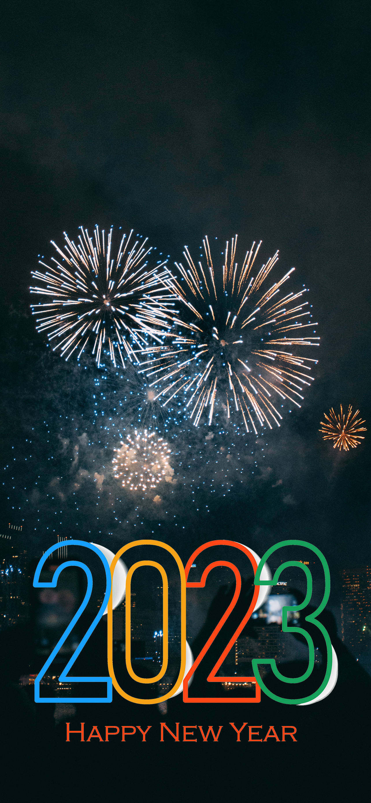 新年快樂 桌布 壁紙 — 充滿活力的煙火在城市天際線上綻放，色彩繽紛的「2023」字樣在漆黑的夜空下慶祝除夕。