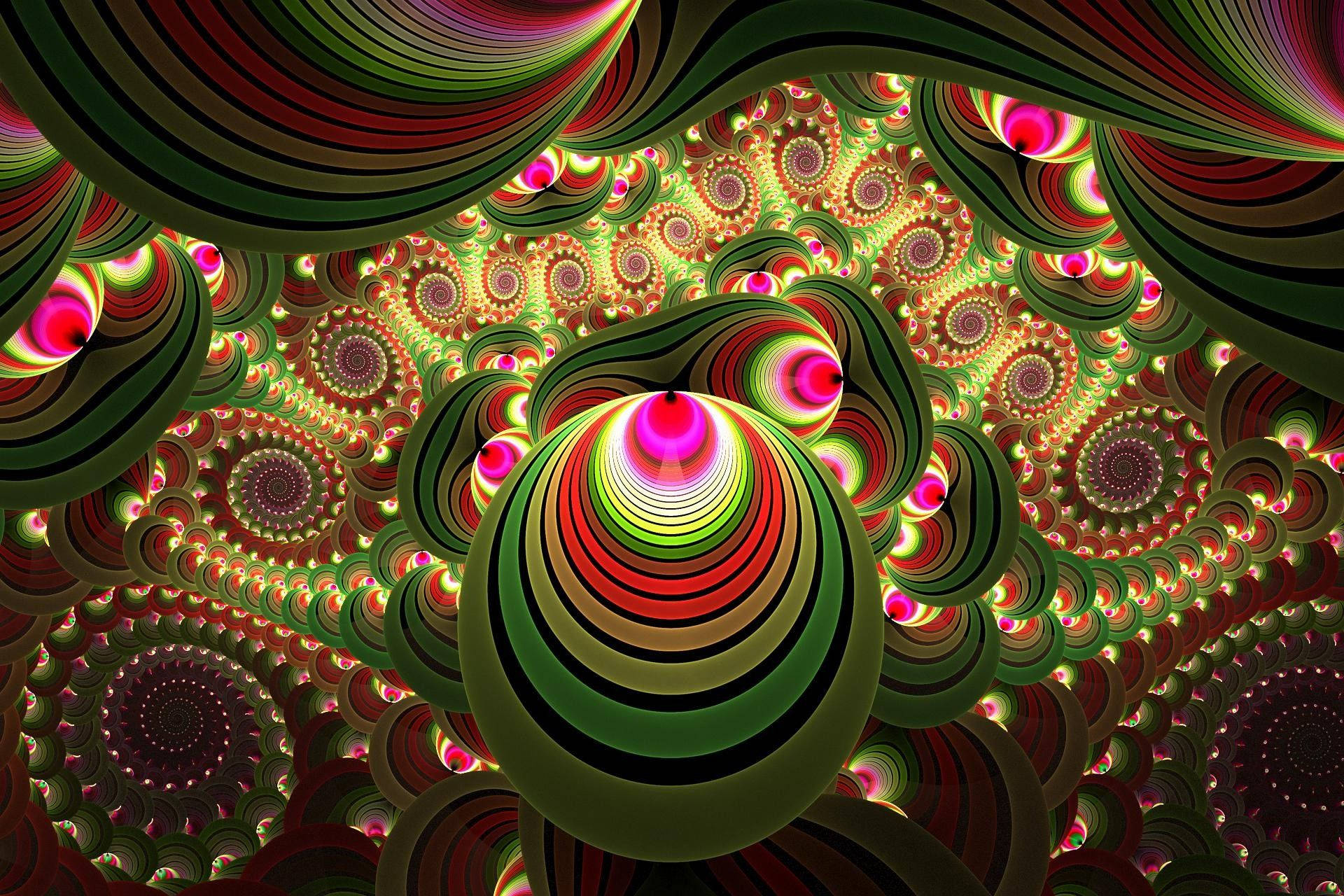 嬉皮 桌布 壁紙 — 充滿活力的碎形圖案在催眠般的同心圓中旋轉，帶有霓虹粉、綠和紅色調，營造出迷幻的隧道效果。