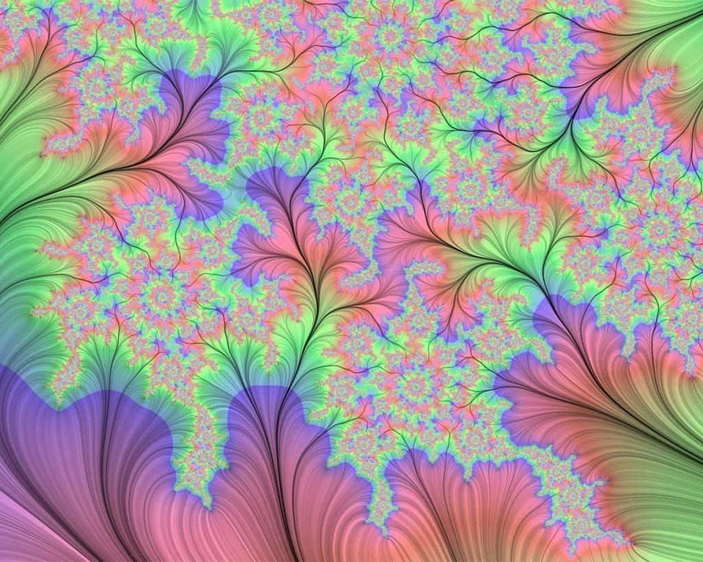 Pastel Tie Dye 桌布 壁紙 — 充滿活力的碎形圖案在霓虹粉紅、綠色和紫色中綻放，帶有黑色分支脈絡，營造出迷幻的數位藝術作品。