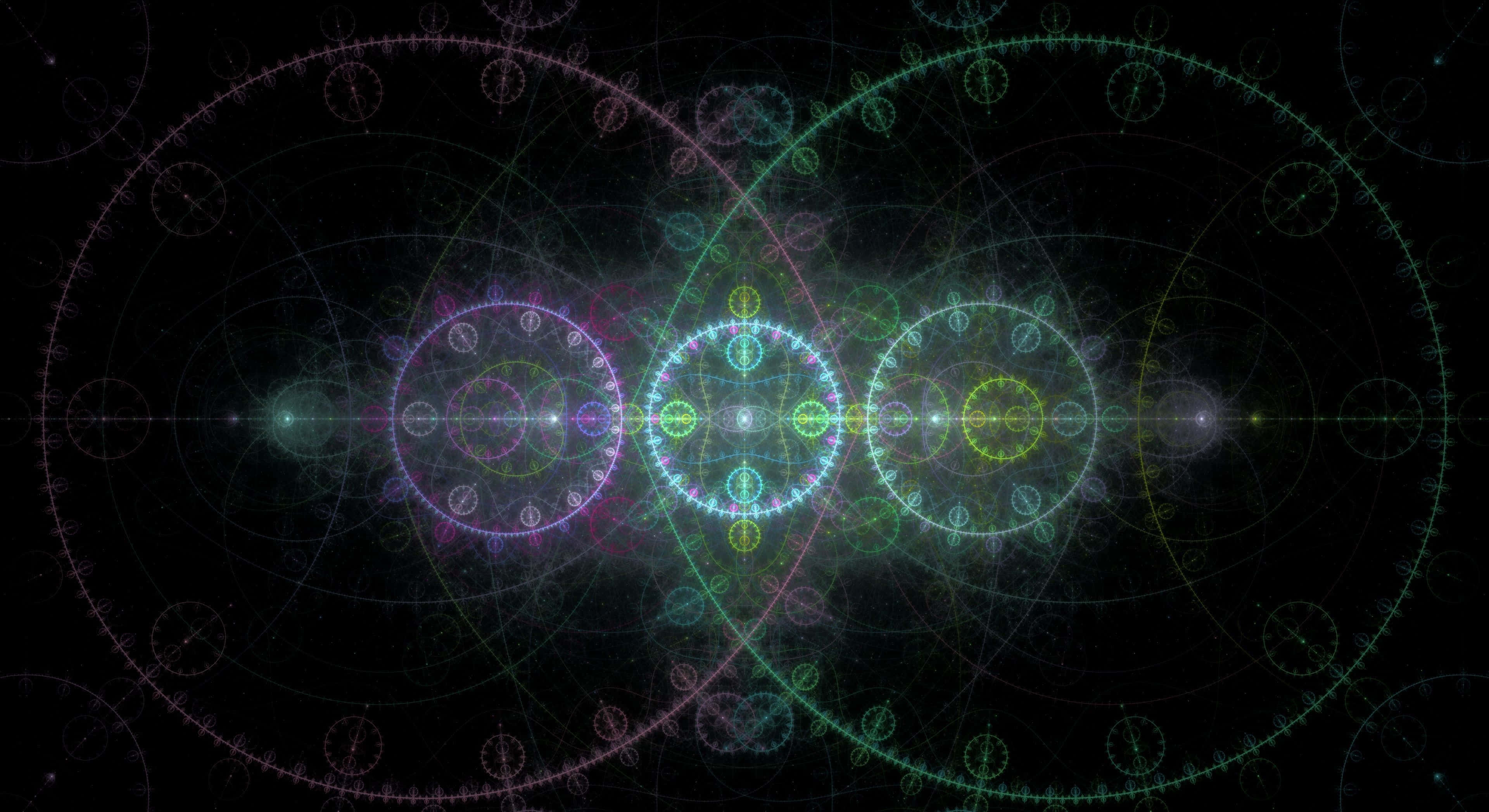 Sacred Geometry 桌布 壁紙 — 充滿活力的碎形圖案在黑暗的宇宙背景下散發出霓虹色彩，形成對稱的幾何設計。