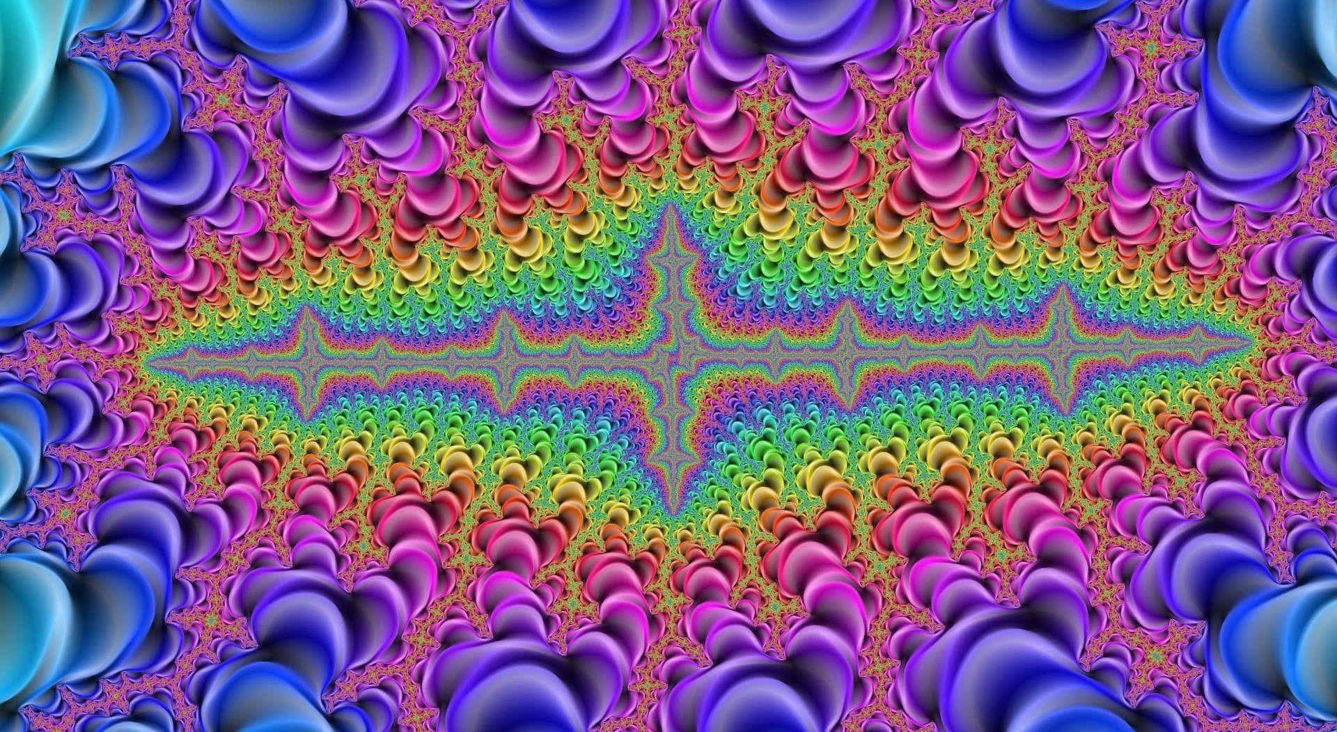 迷幻動圖 桌布 壁紙 — 充滿活力的碎形圖案從中央的星爆向外輻射，帶有旋轉的彩虹色調和球根狀紋理。