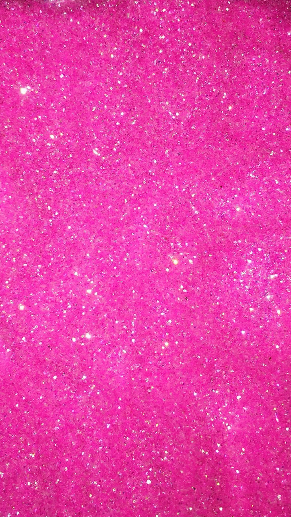 Pink Sparkles 桌布 壁紙 — 充滿活力的粉紅色亮片紋理，帶有閃爍的白色斑點，營造出耀眼而喜慶的表面。