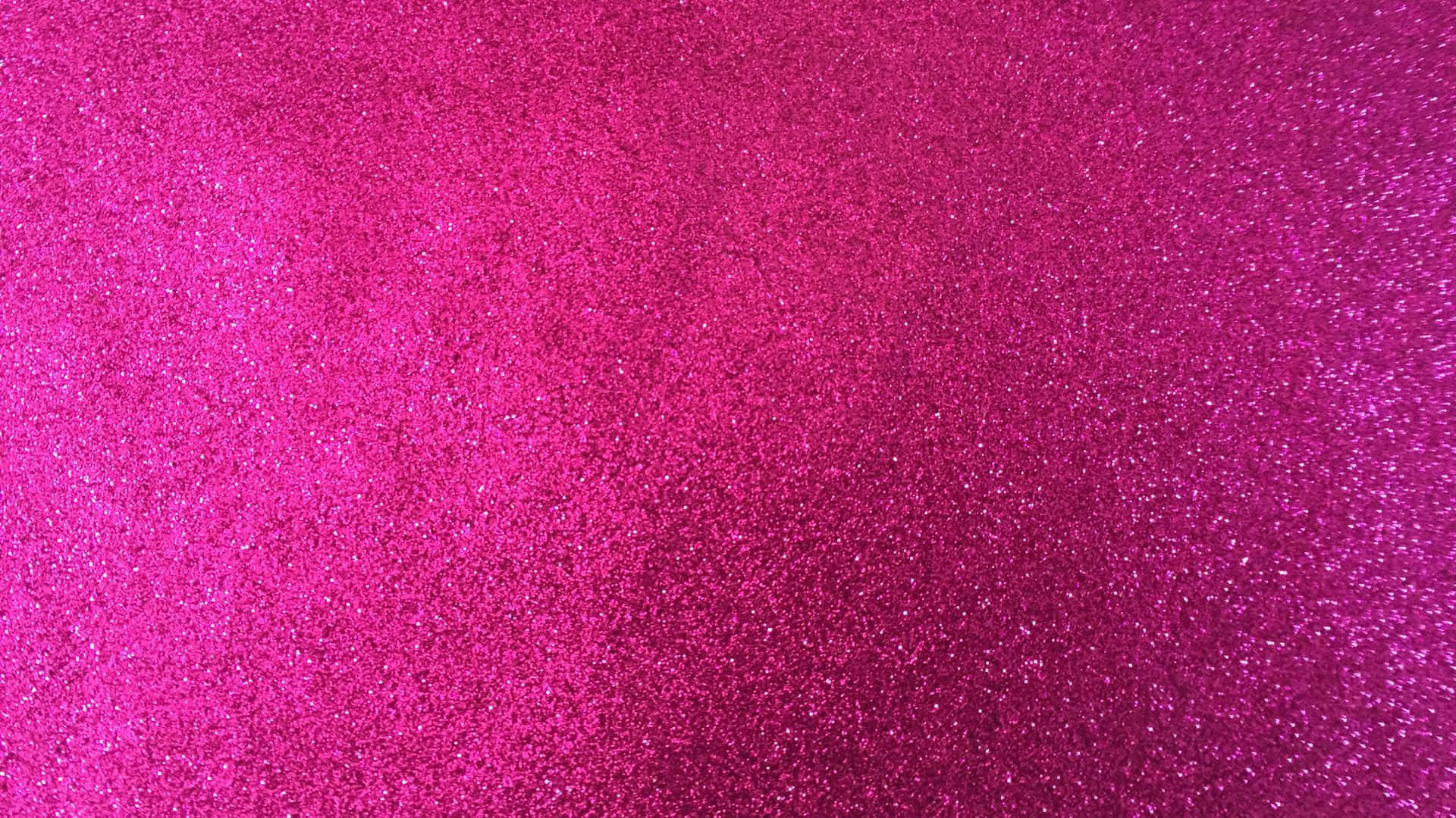 Pink Texture 桌布 壁紙 — 充滿活力的粉紅色亮片紋理，帶有閃爍的粒子，營造出閃閃發光的抽象表面。