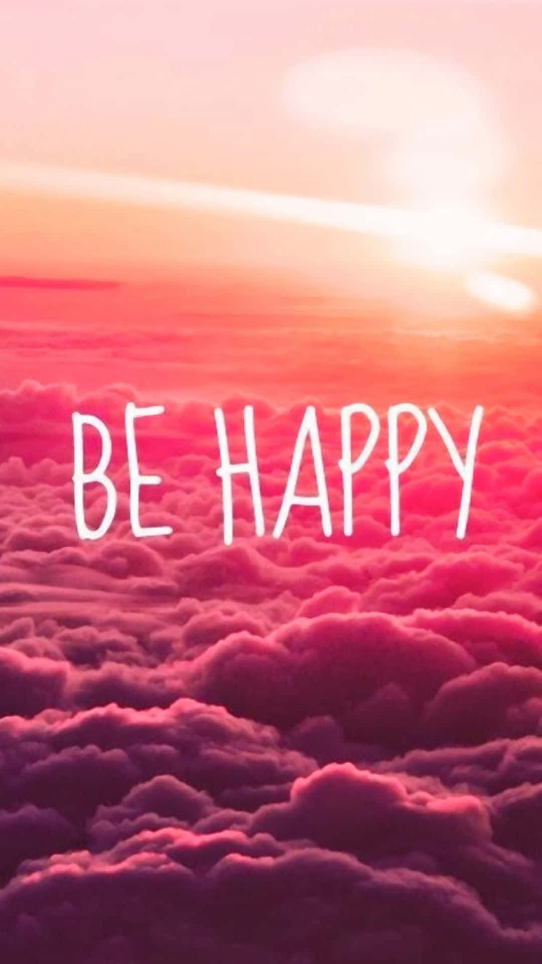 cute happy 桌布 壁紙 — 充滿活力的粉紅色和橙色日落天空，有蓬鬆的雲朵，上面漂浮著令人振奮的訊息「要快樂」。