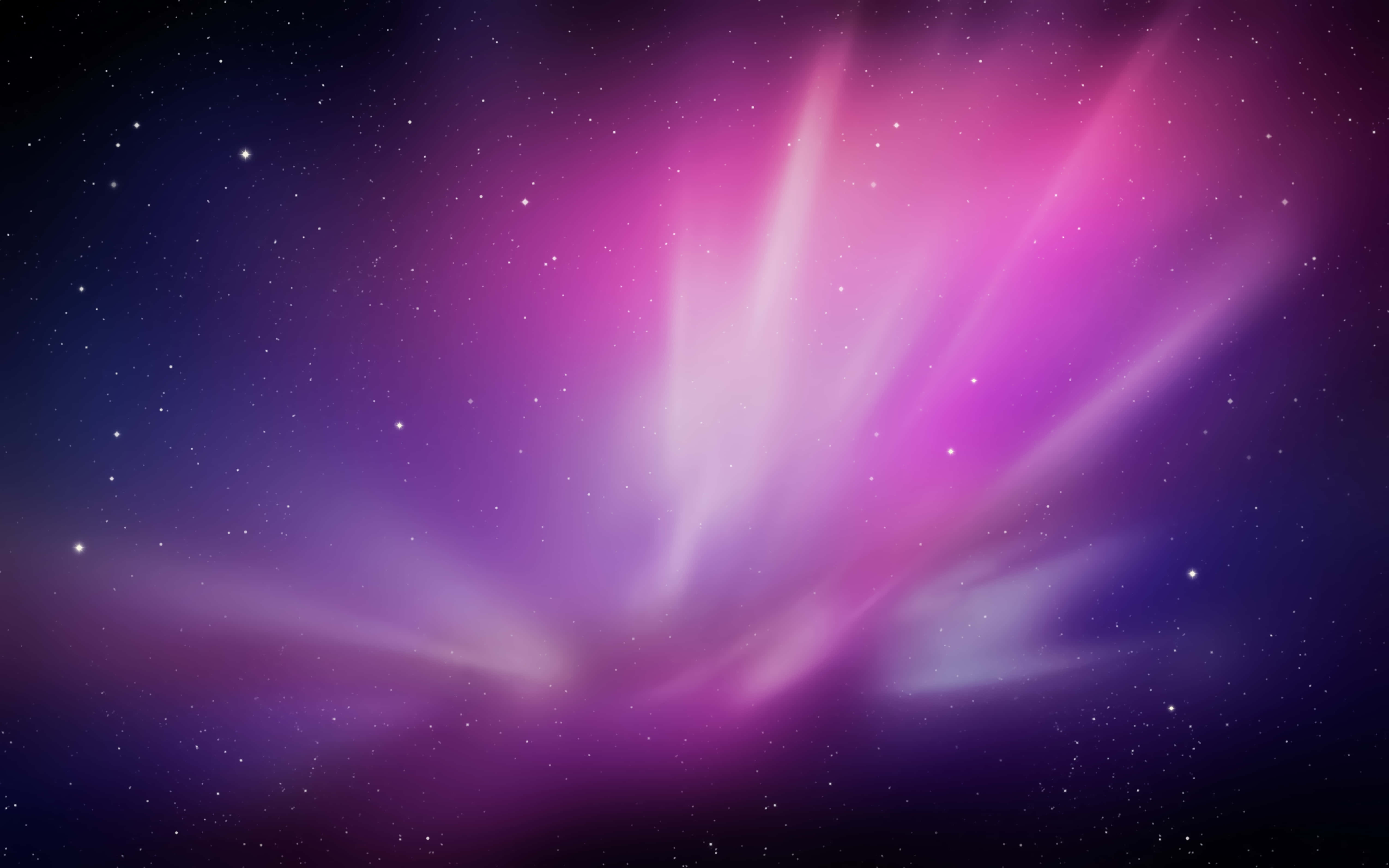 Apple 4K 桌布 壁紙 — 充滿活力的粉紅色和紫色極光在繁星點點的夜空中劃過，呈現宇宙奇觀。