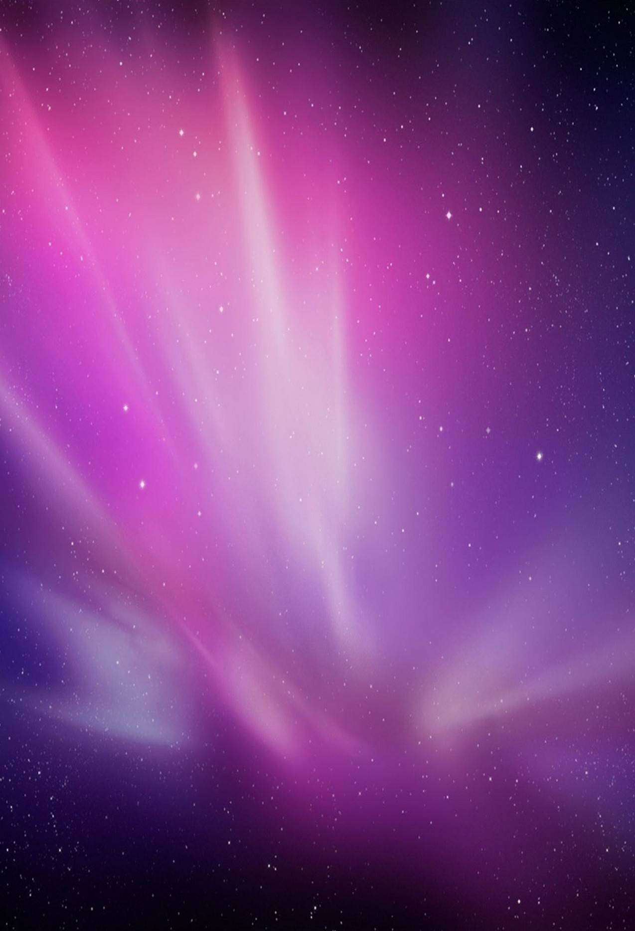 iOS 8 桌布 壁紙 — 充滿活力的粉紅色和紫色極光在繁星點點的夜空中舞動，上演一場宇宙表演。
